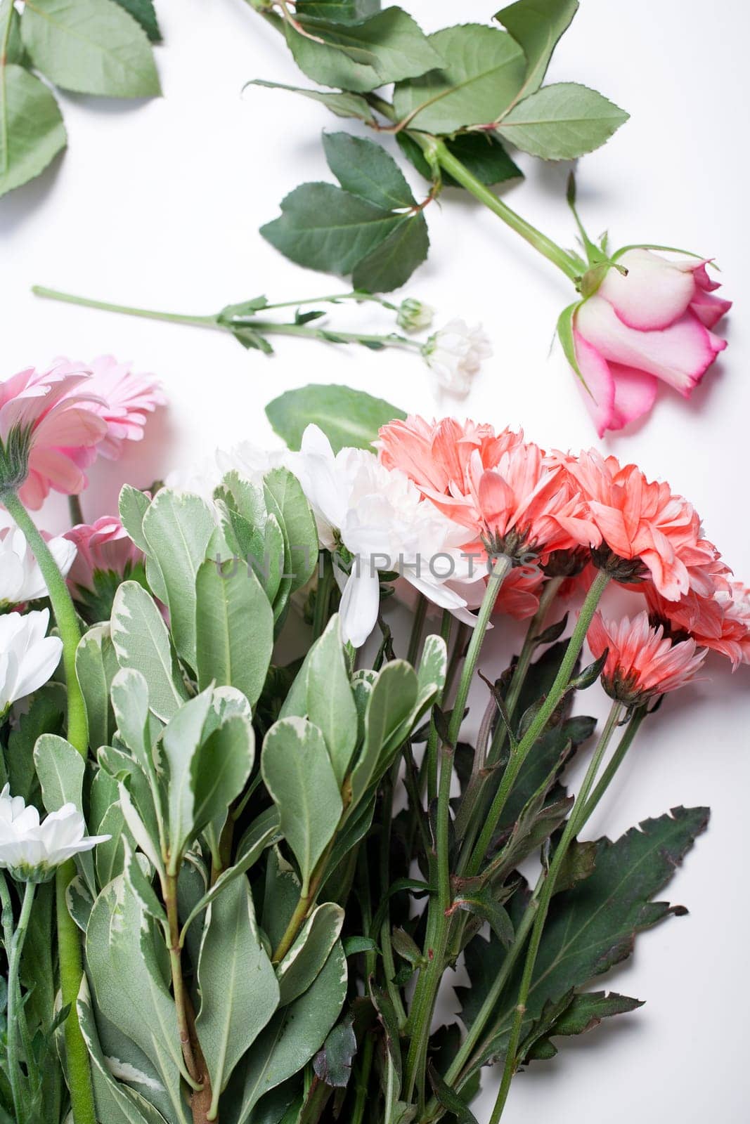 Flower cuttings being prepared to be arranged to make a bouquet.