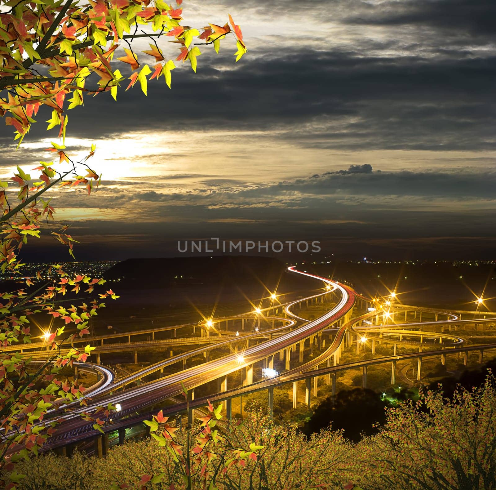 Highway in night with cars light in modern city in Taiwan, Asia.
