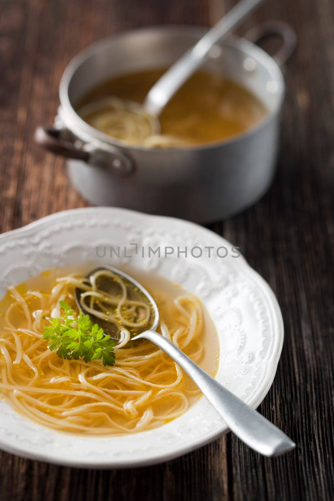 Beef stock with noodles close up shoot