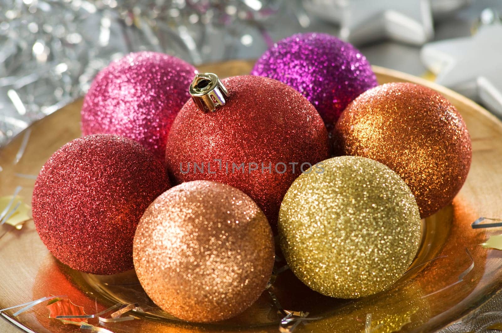 christmas ornaments on golden plate close up shoot
