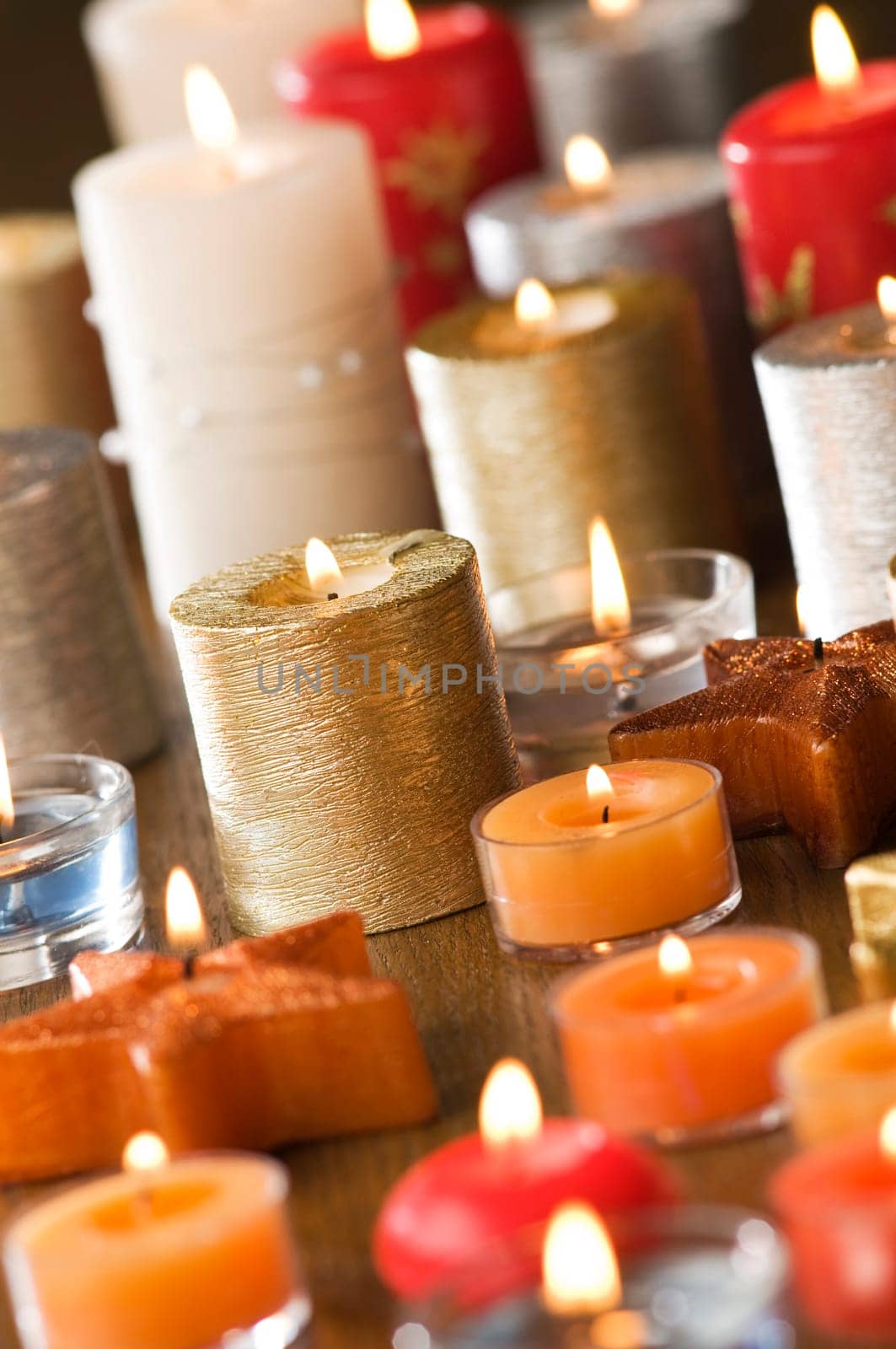 many colorful candles for christmas close up shoot