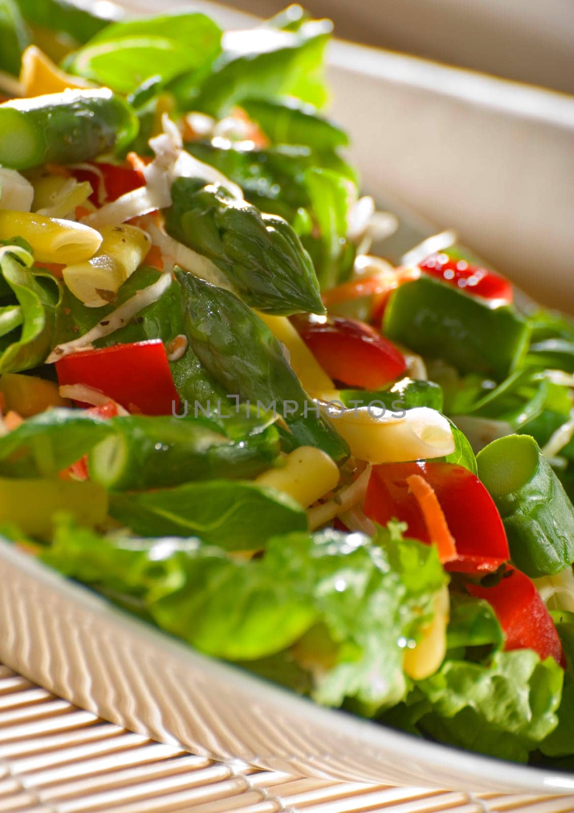 fresh colorful salad with asparagus close up shoot