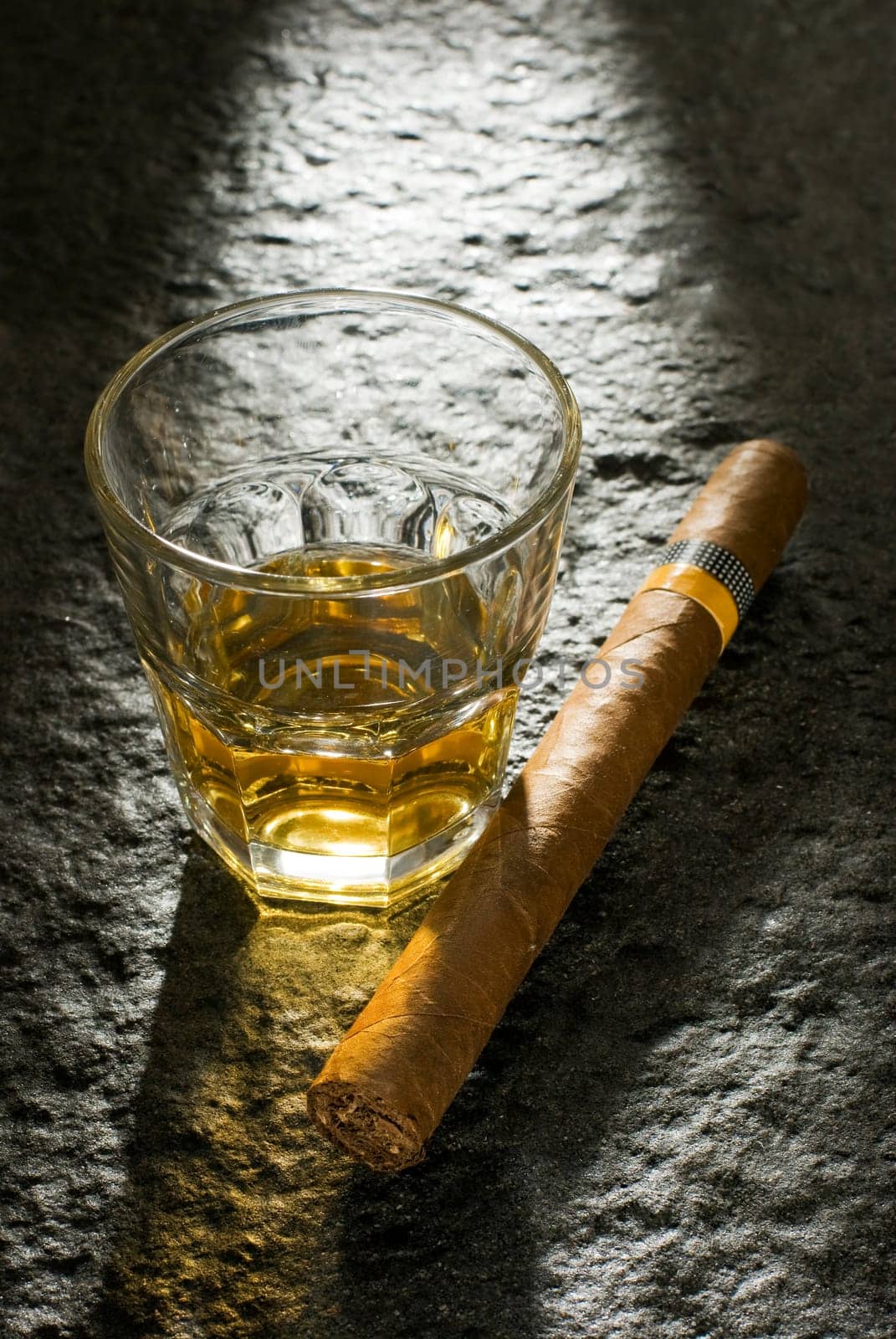whiskey and cuban cigar close up shoot