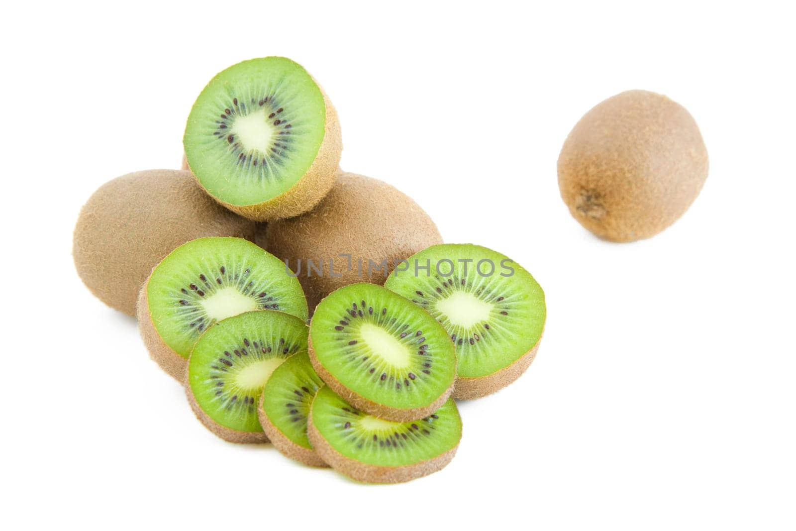 Fresh green kiwi slices isolated on white