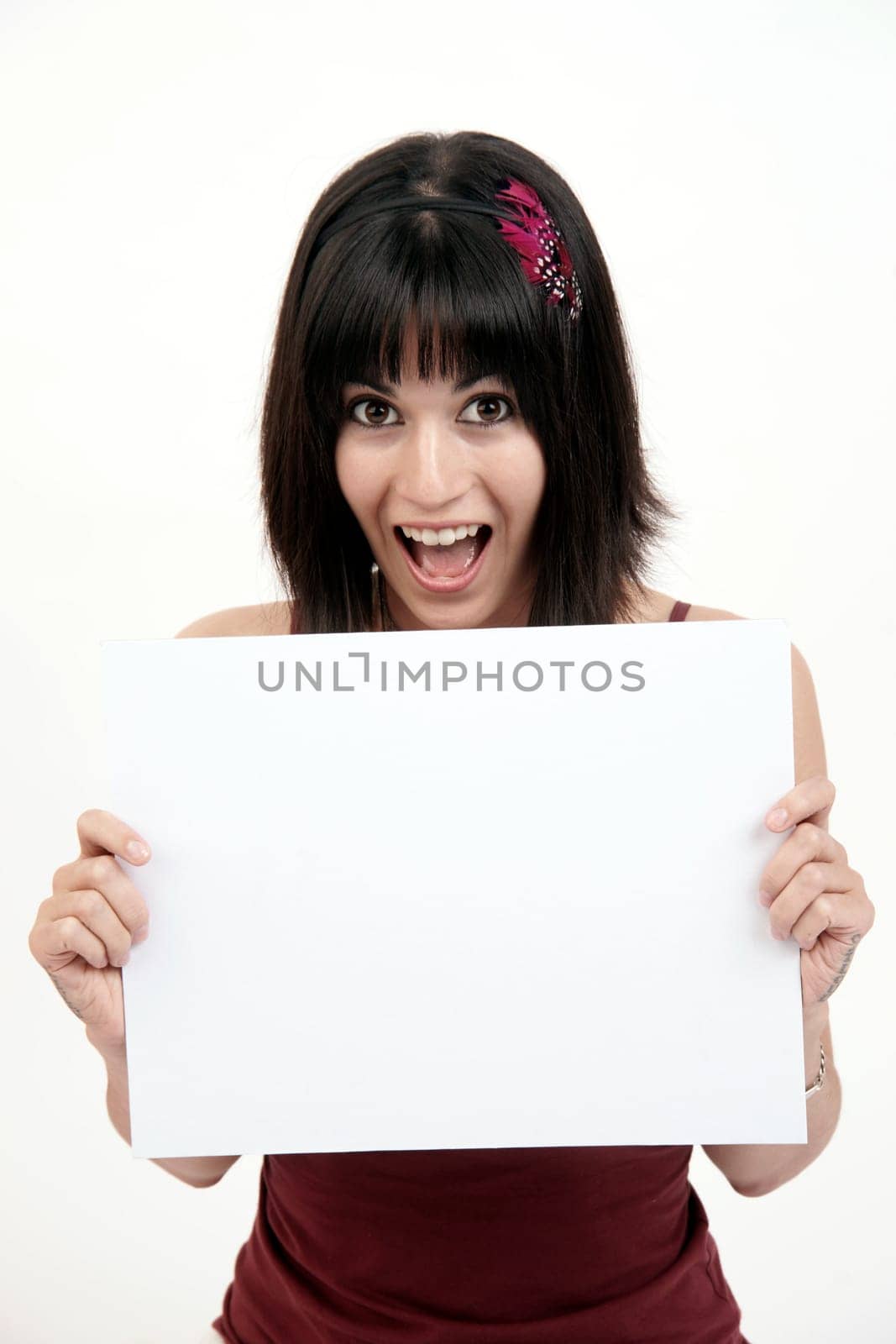 Woman holds a blank white card