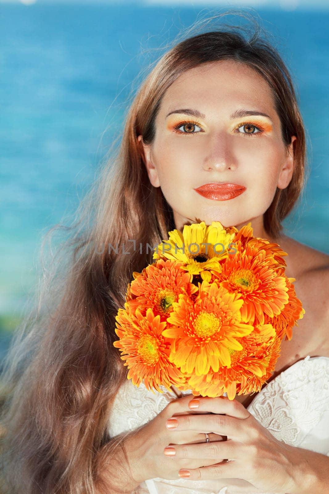 Beautiful bride with wedding bouquet