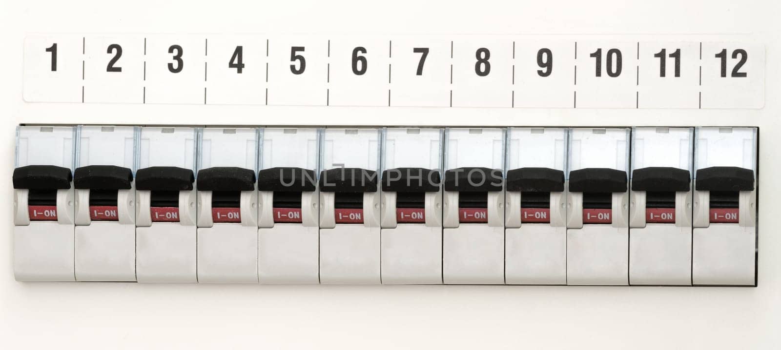 12 fuses on a light-colored wall