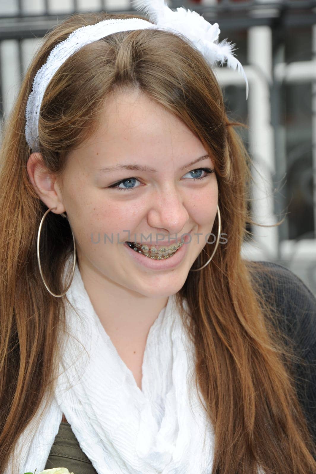 Laughing girl portrait with braces