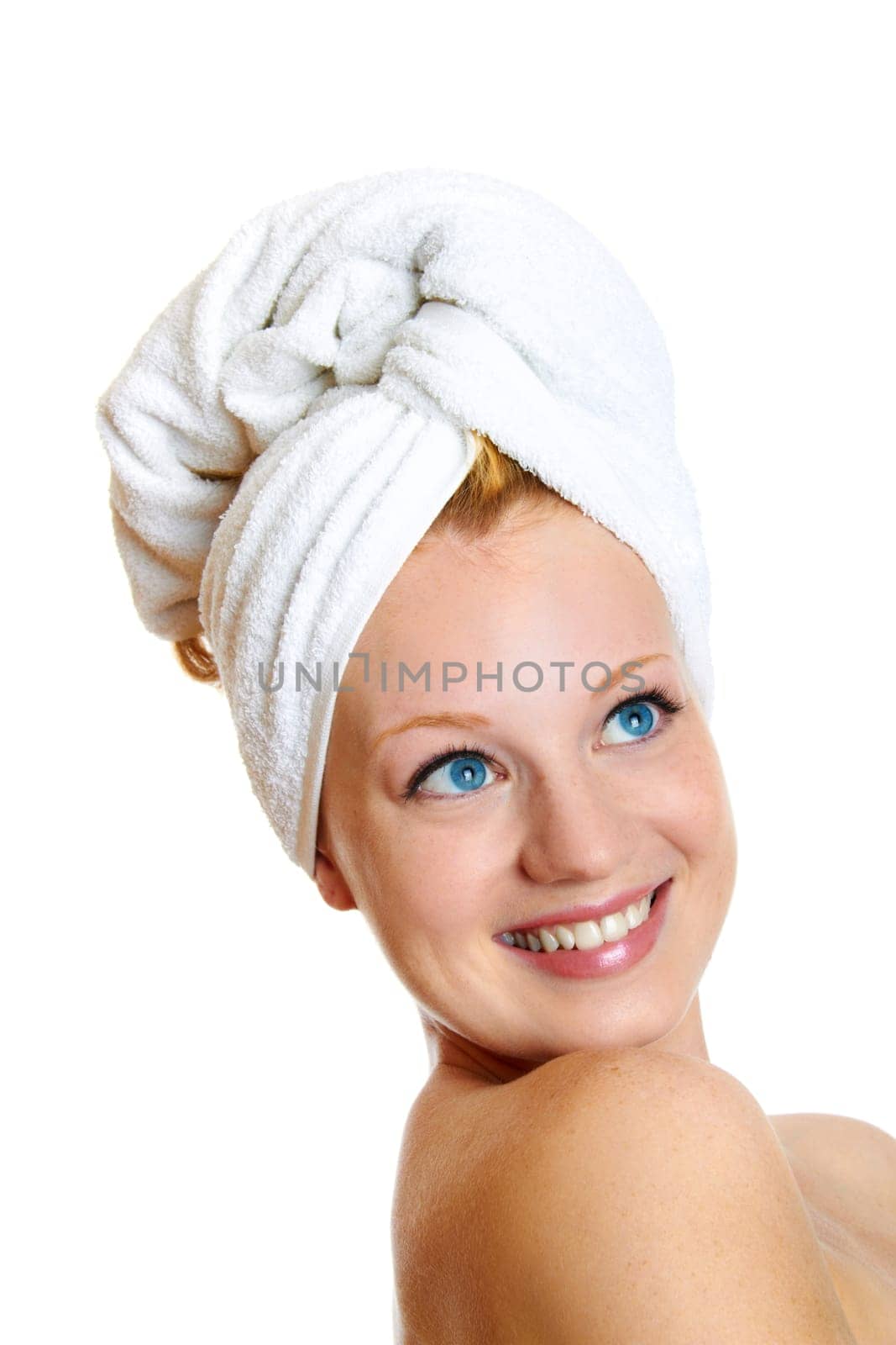 portrait of a beautiful blonde with white towel on her head