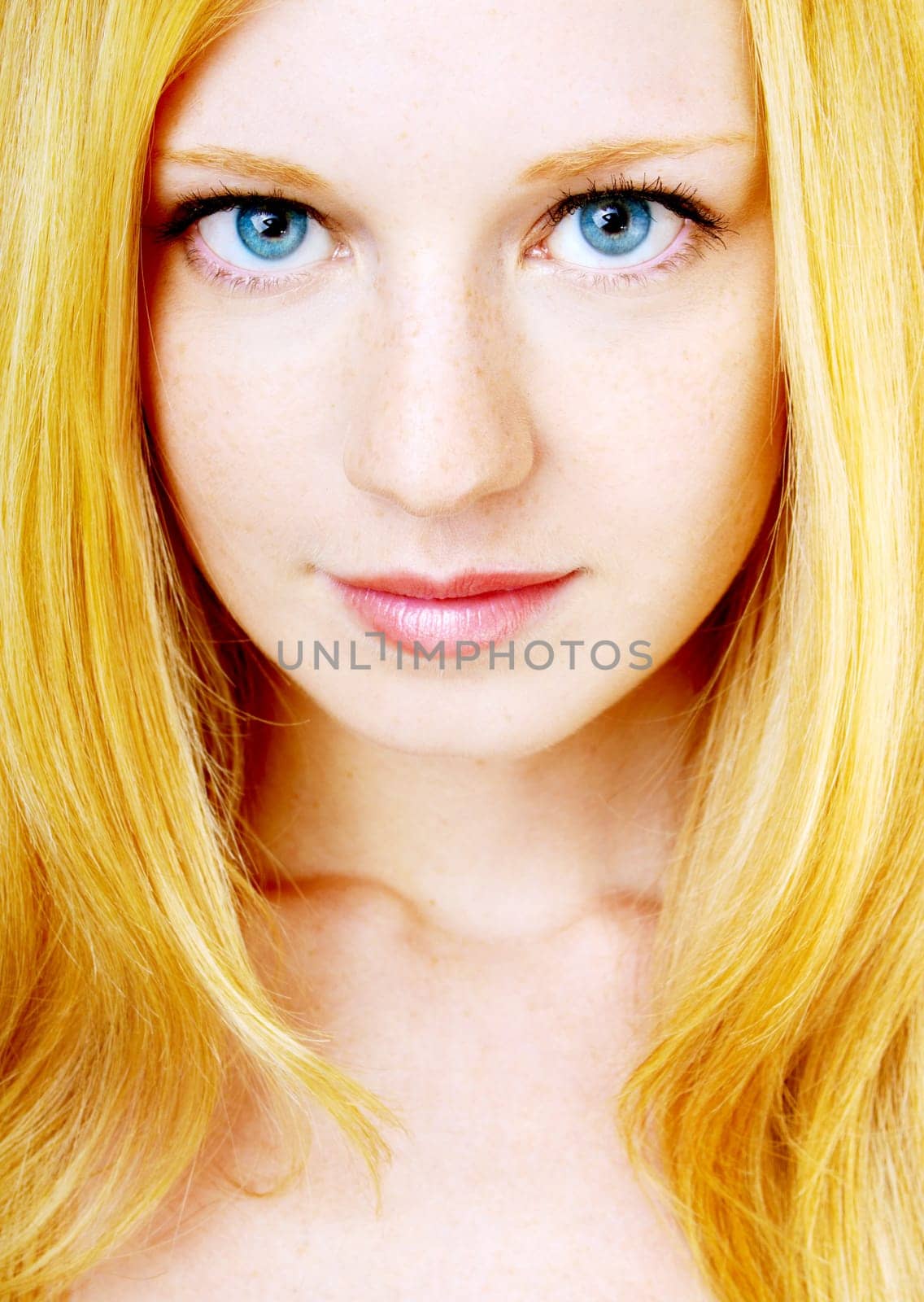 portrait of a beautiful blonde girl with strong and healthy hair