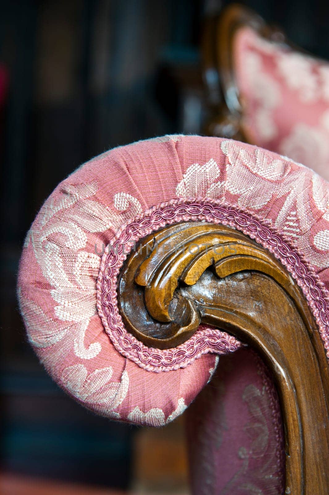 Detail of an old sofa in fabric