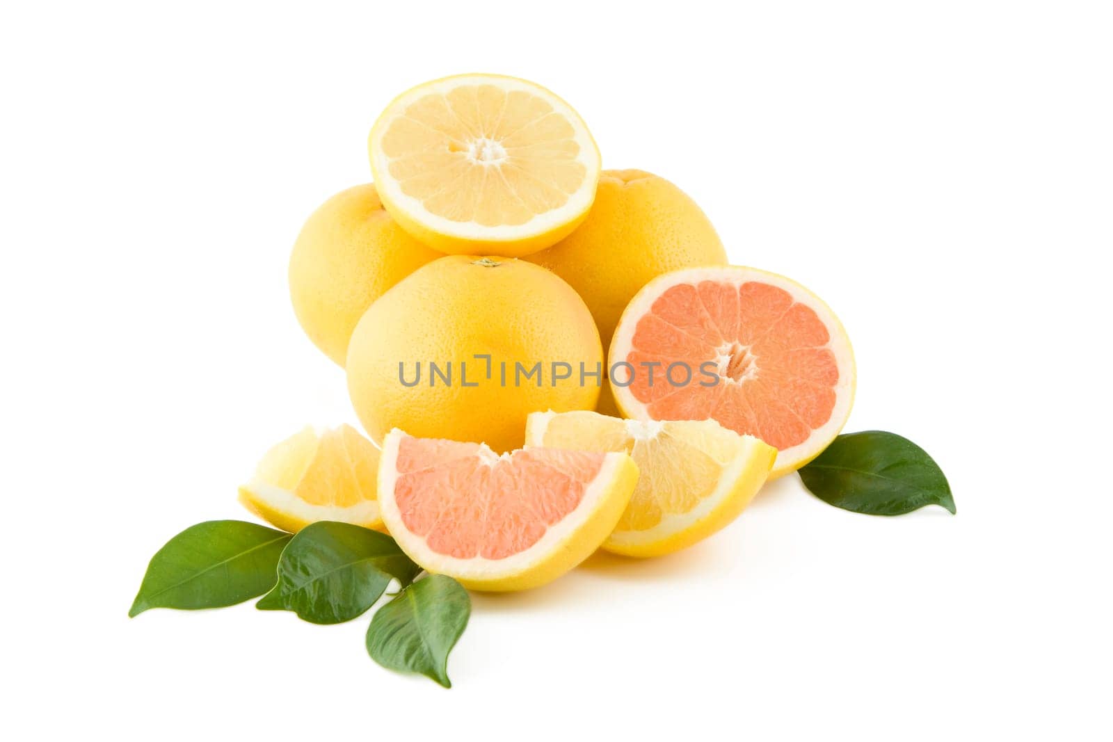 Fresh white and red grapefruits isolated on white background