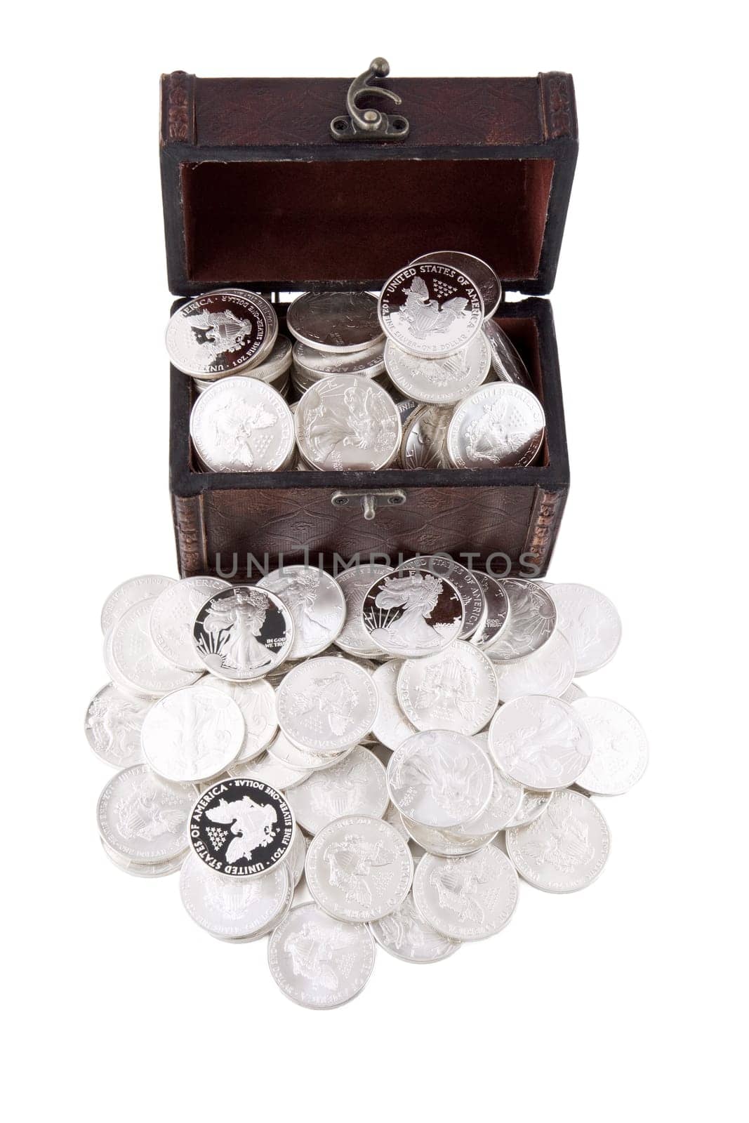 Old case with silver coins, isolated on white background
