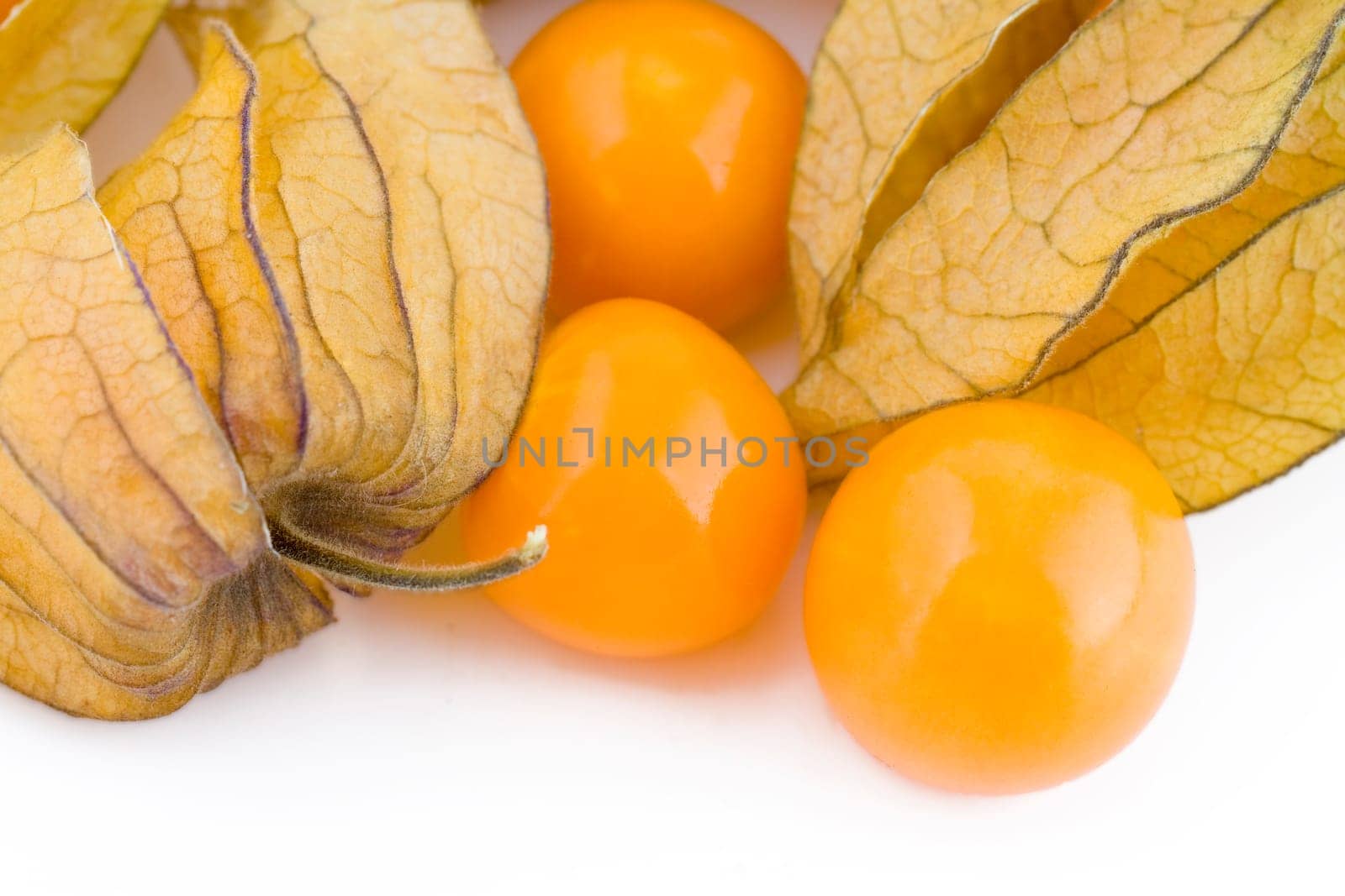 Fresh small physalis isolated on white background, jam-berry fruits