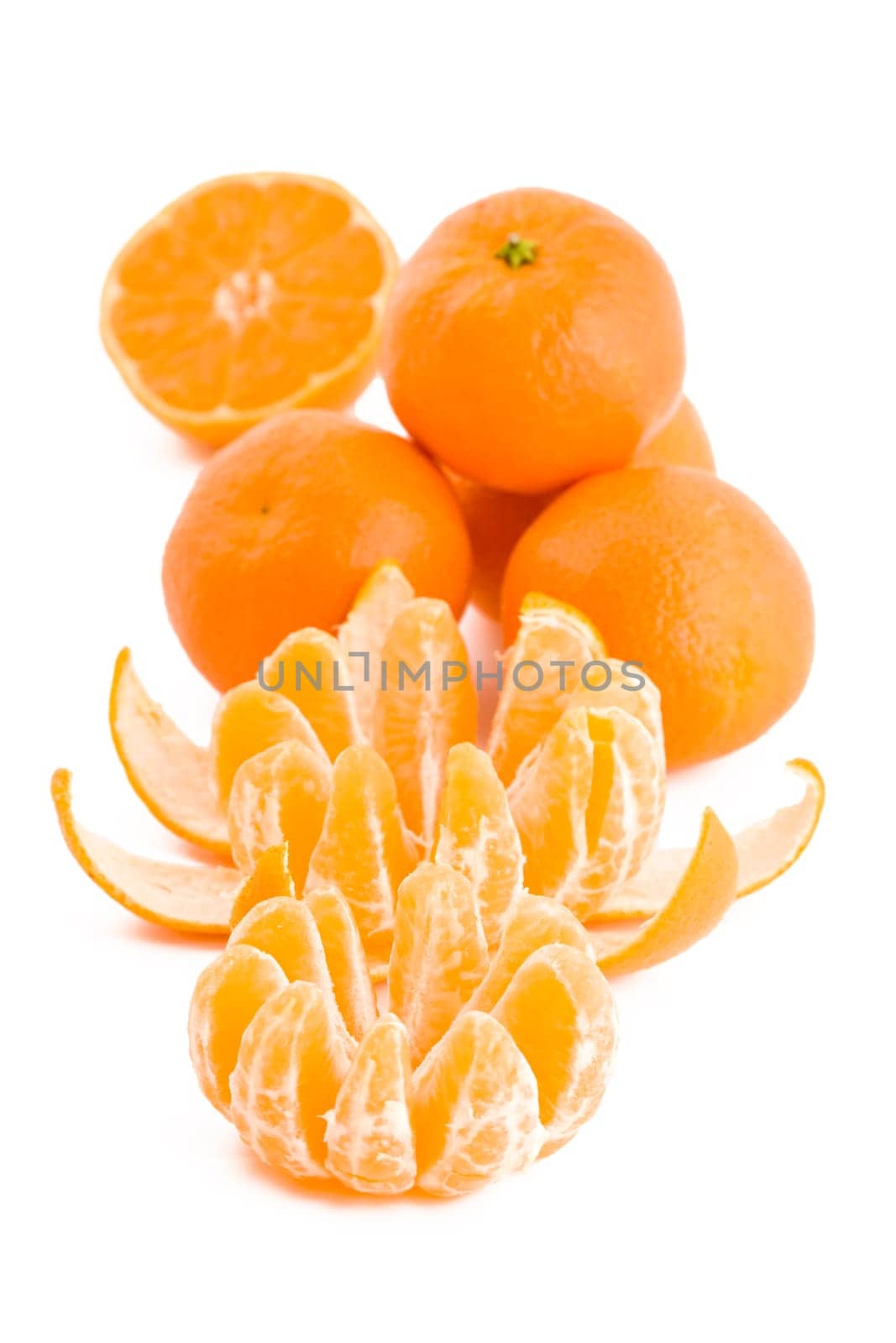 Fresh juicy tangerines in isolated on white background