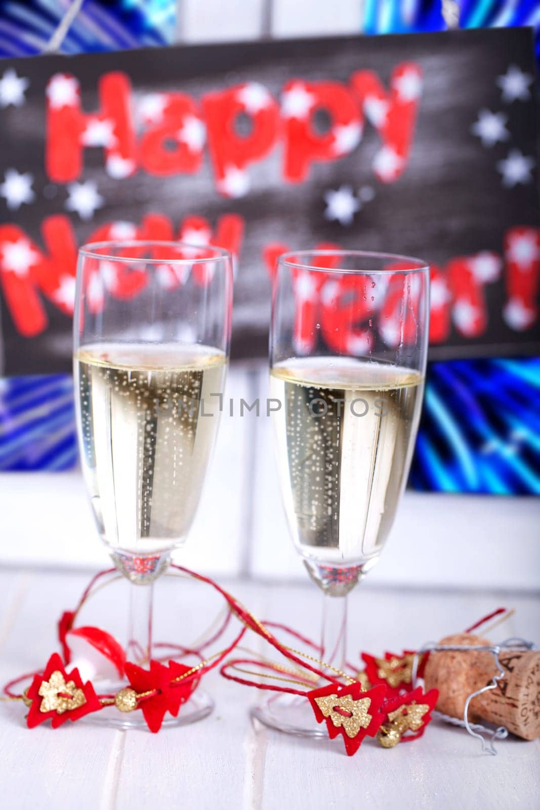 New Year's Eve fireworks with champagne glasses