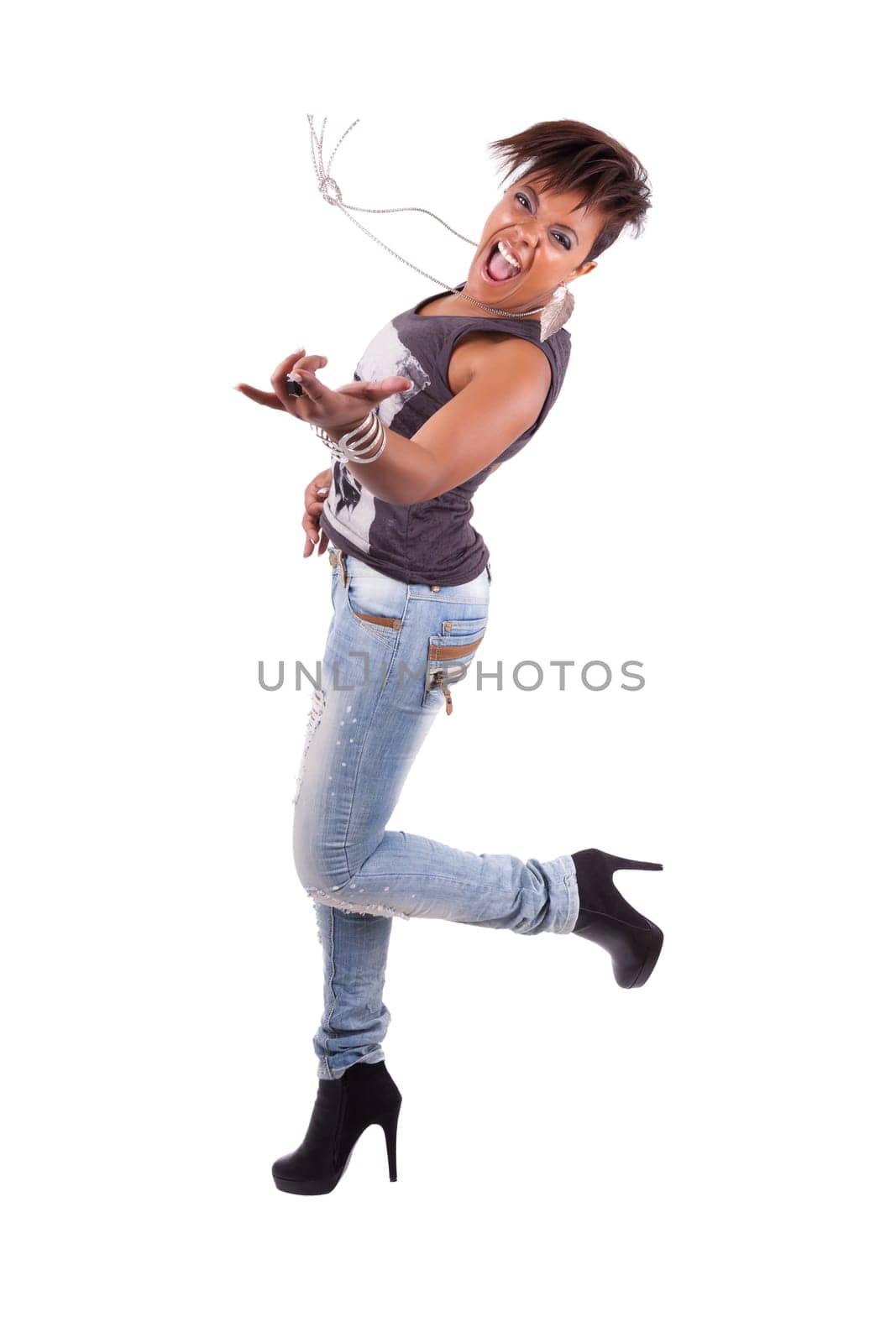 Portrait of a young beautiful black woman  playing air guitar, isolated on white background