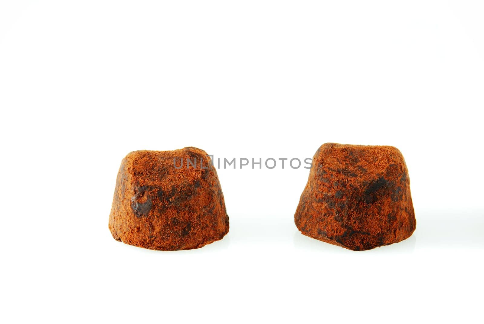 two pralines on white