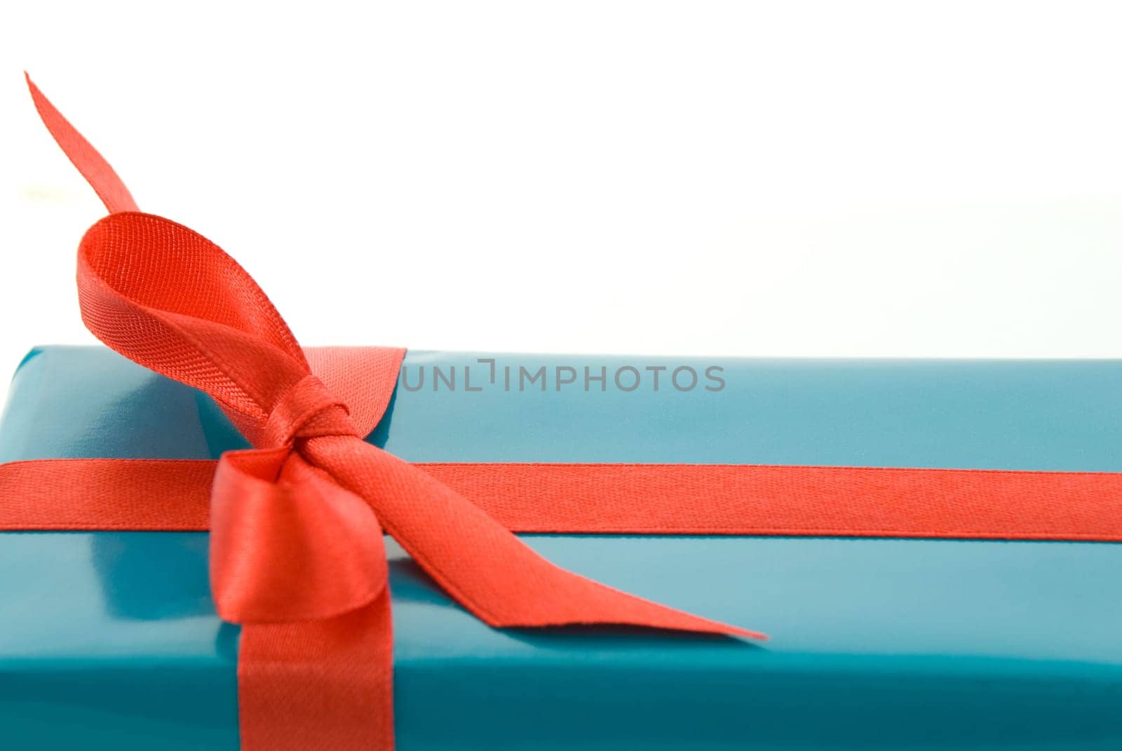cutout of a blue red gift, on white
