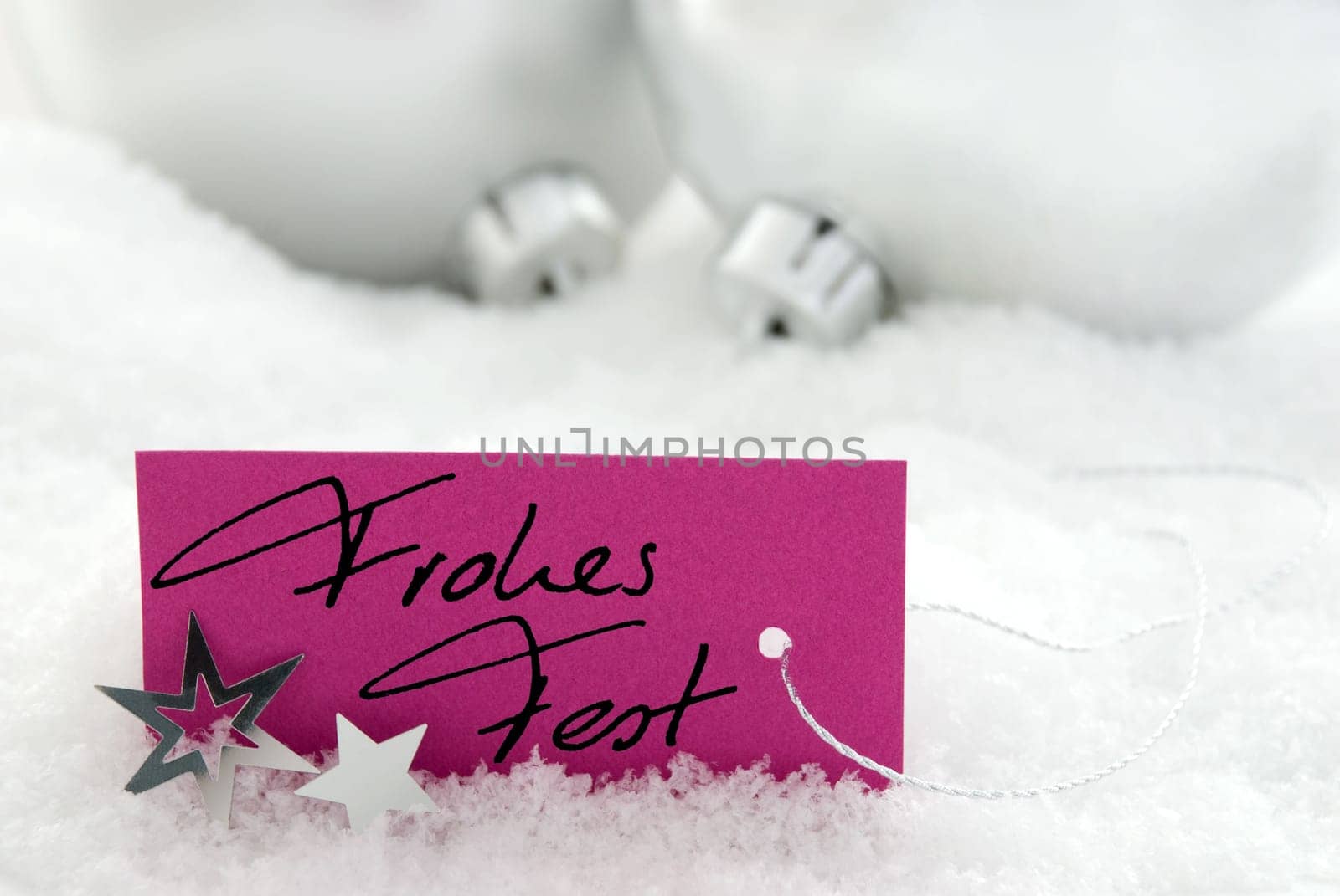 handwritten Frohes Fest on a purple label as christmas background