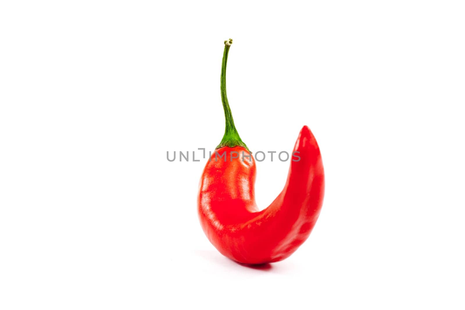 Chili,red pod against white background