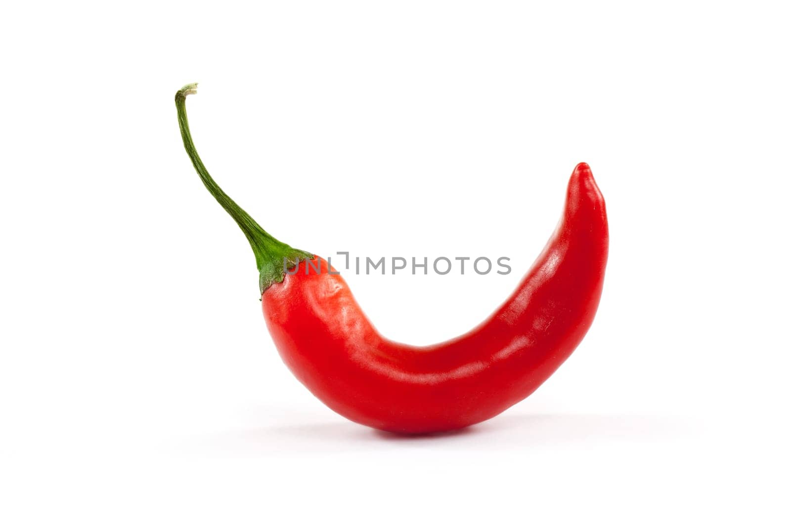 Chili,red pod against white background
