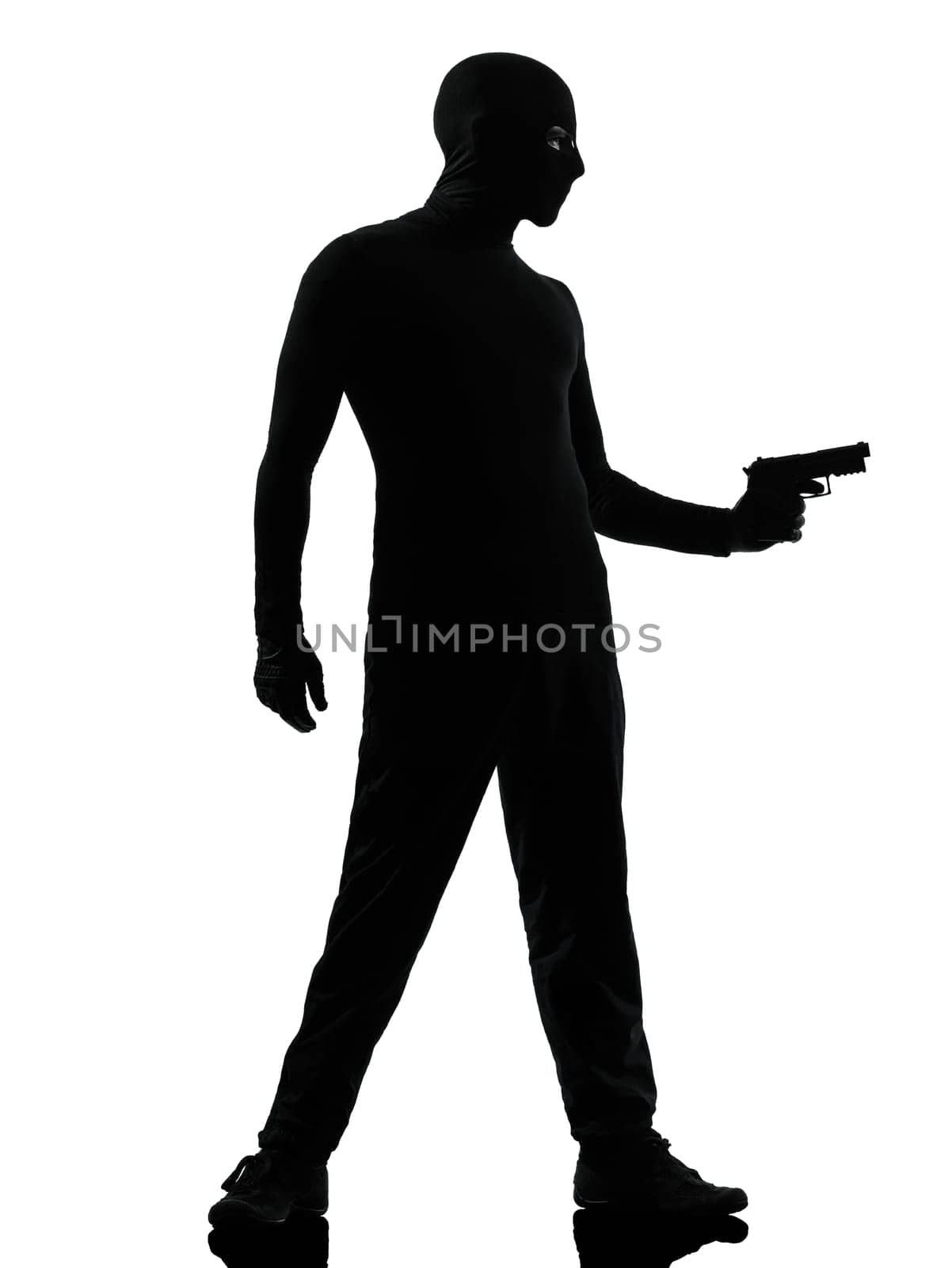 thief criminal terrorist man aiming gun in silhouette studio isolated on white background