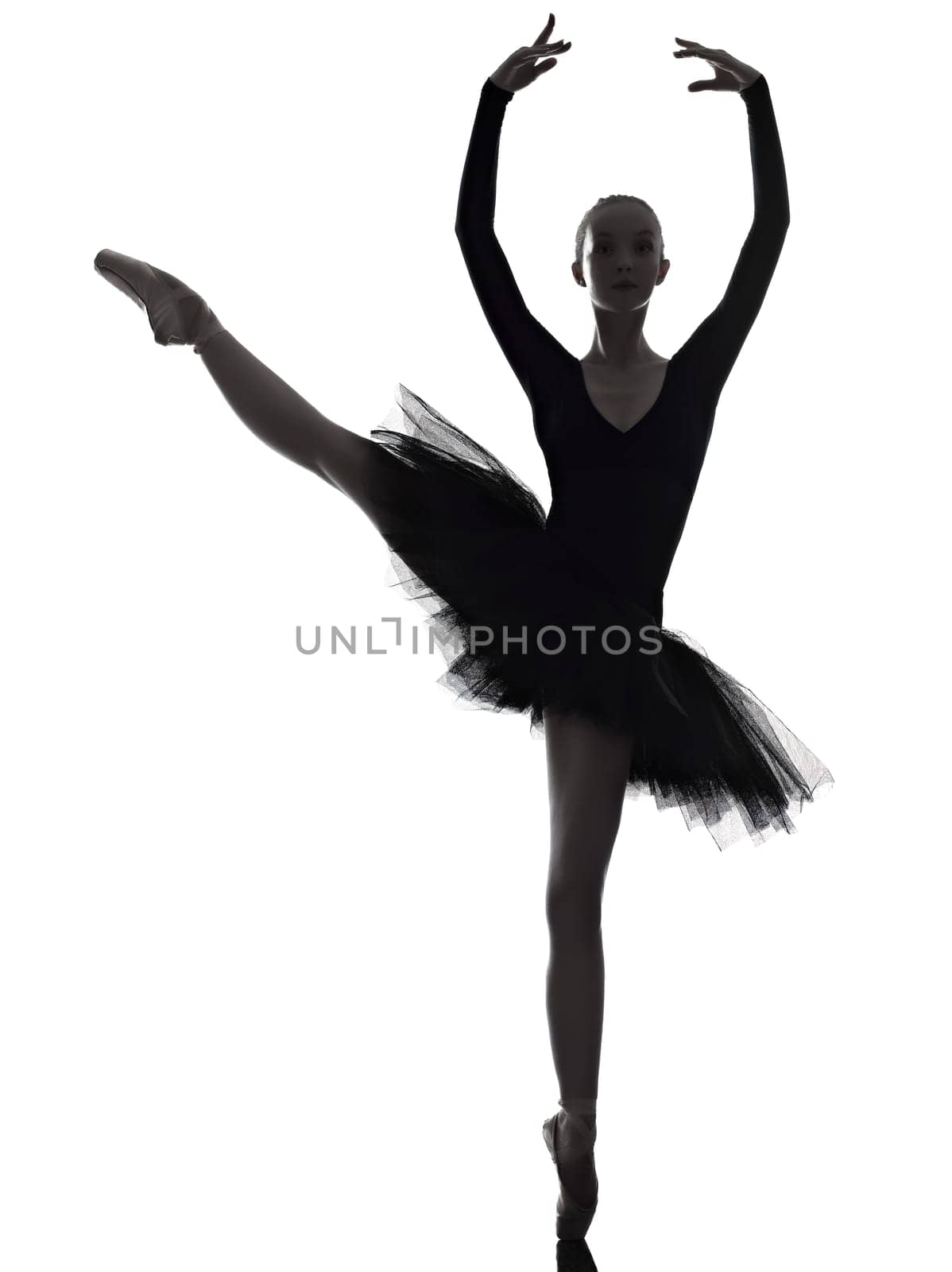one caucasian young woman ballerina ballet dancer dancing with tutu in silhouette studio on white background
