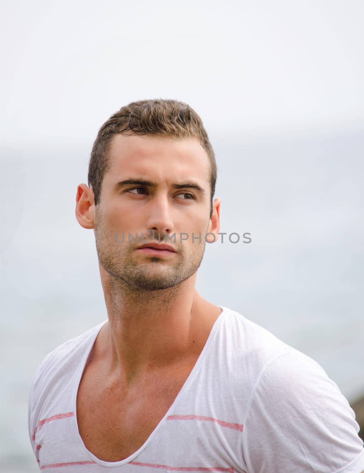 Portait of attractive and fit mediterranean looking young man