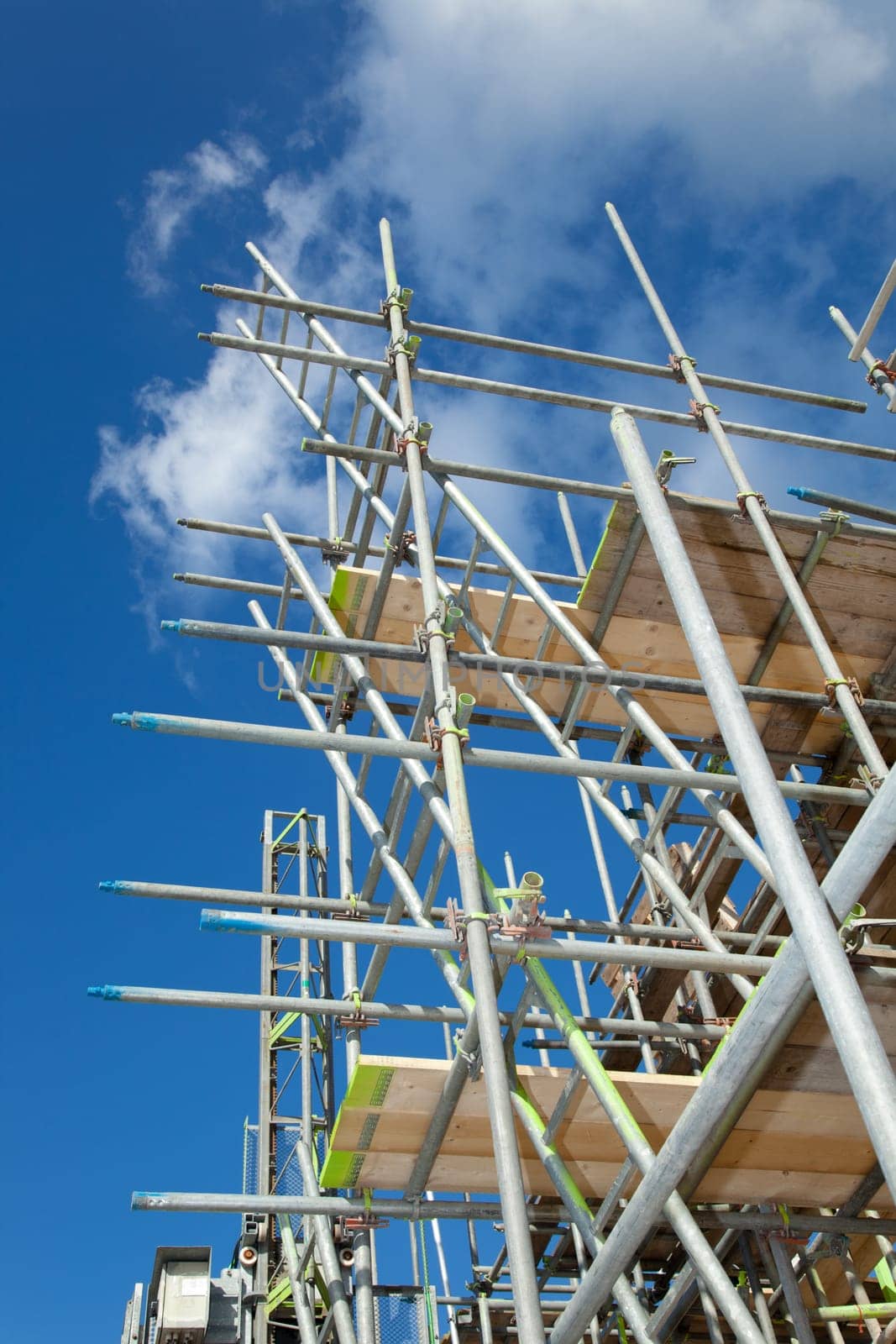 scaffolding construction in building industry with  blue sky