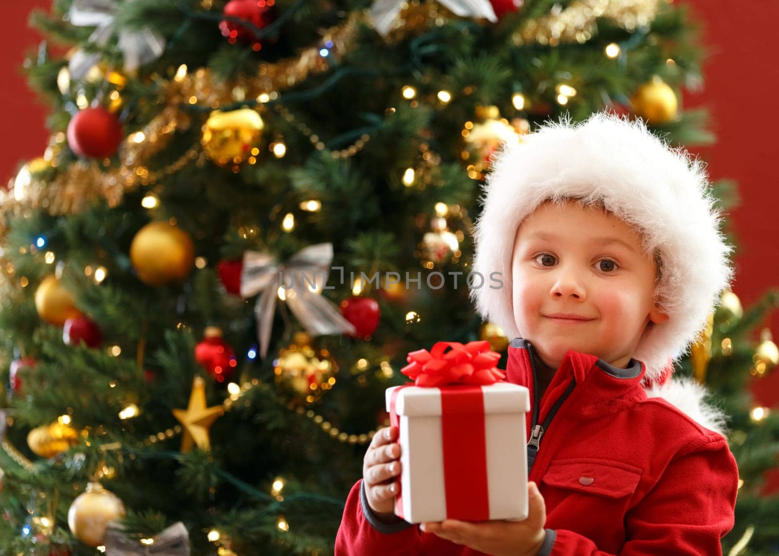 young boy with Christmas gift