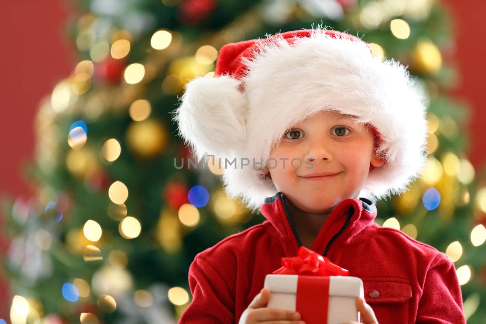 young boy with Christmas gift