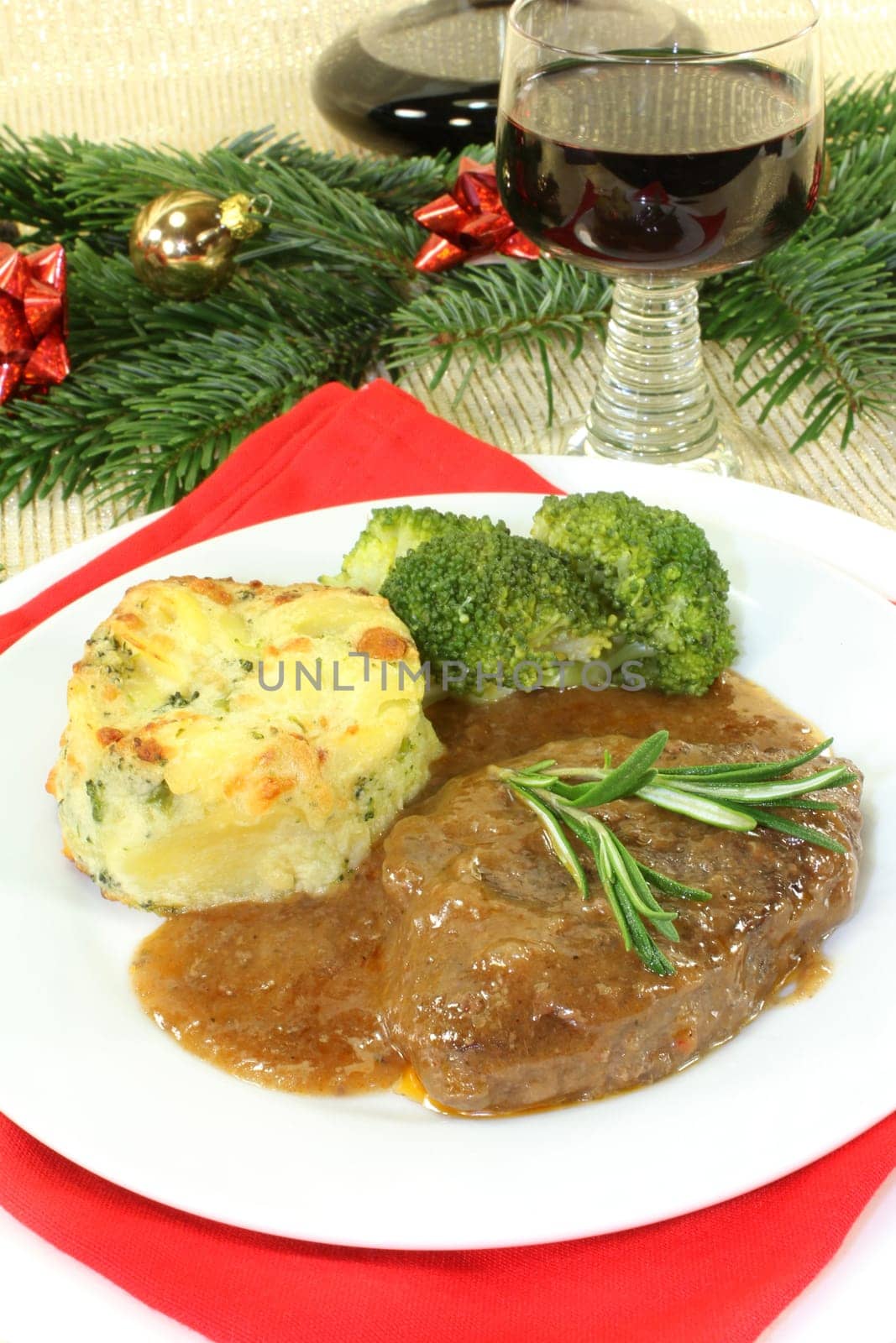 Venison steak with broccoli and potato gratin