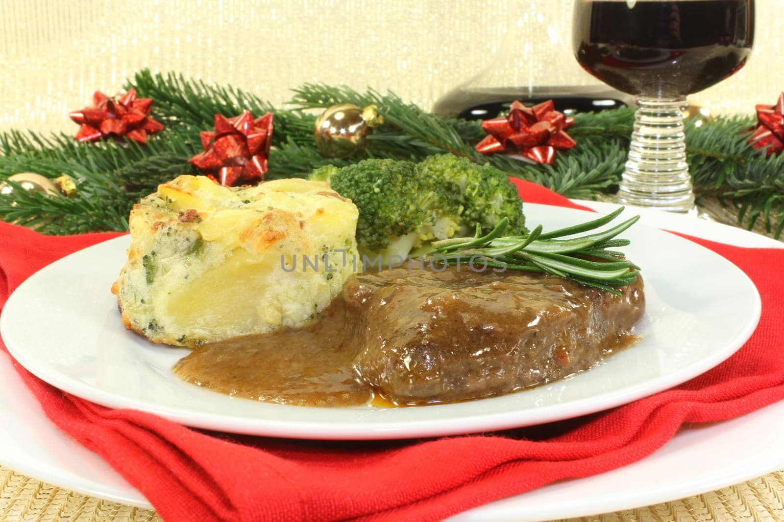 Venison steak with broccoli and potato gratin