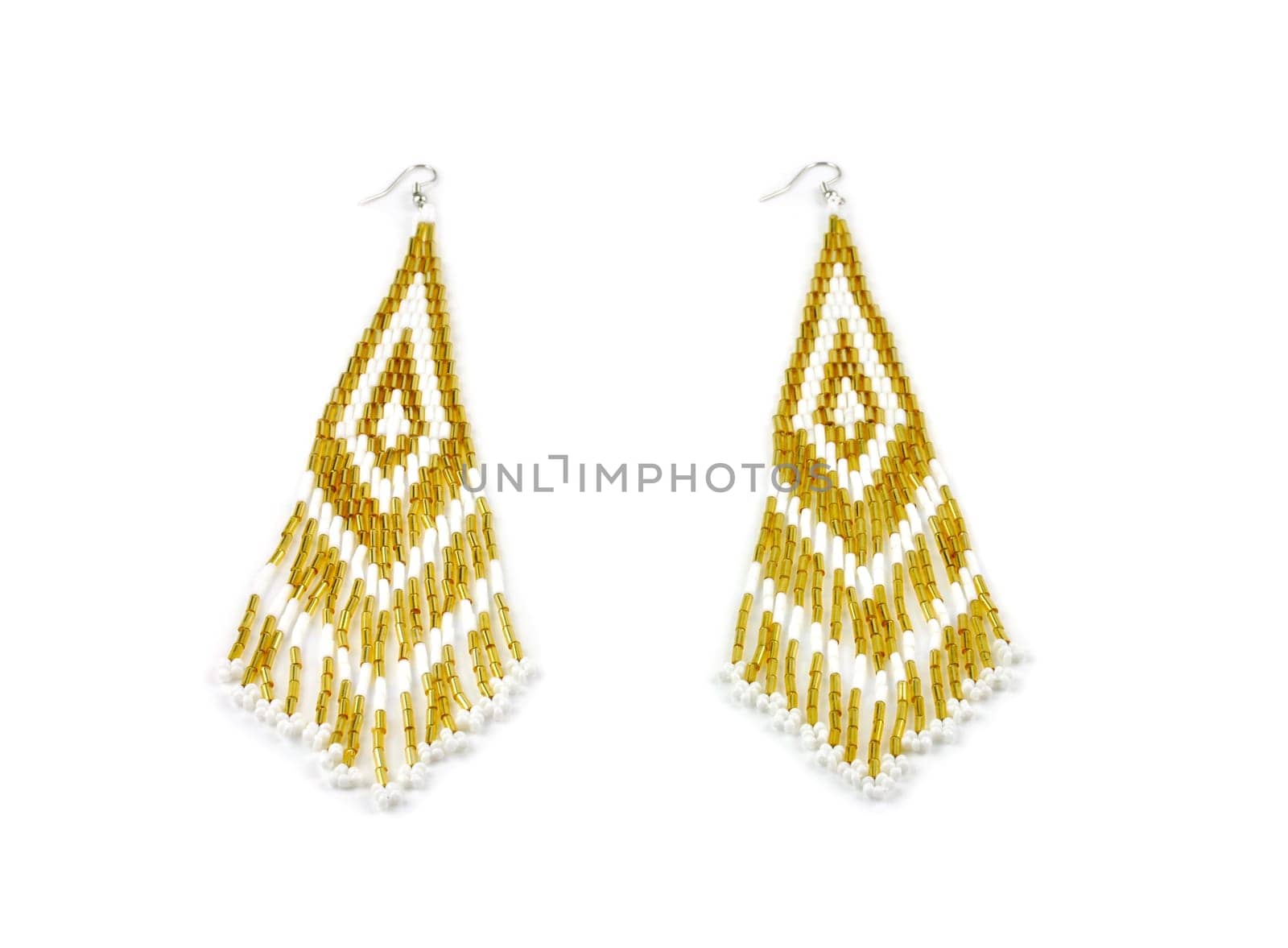 Pair of earrings on white background