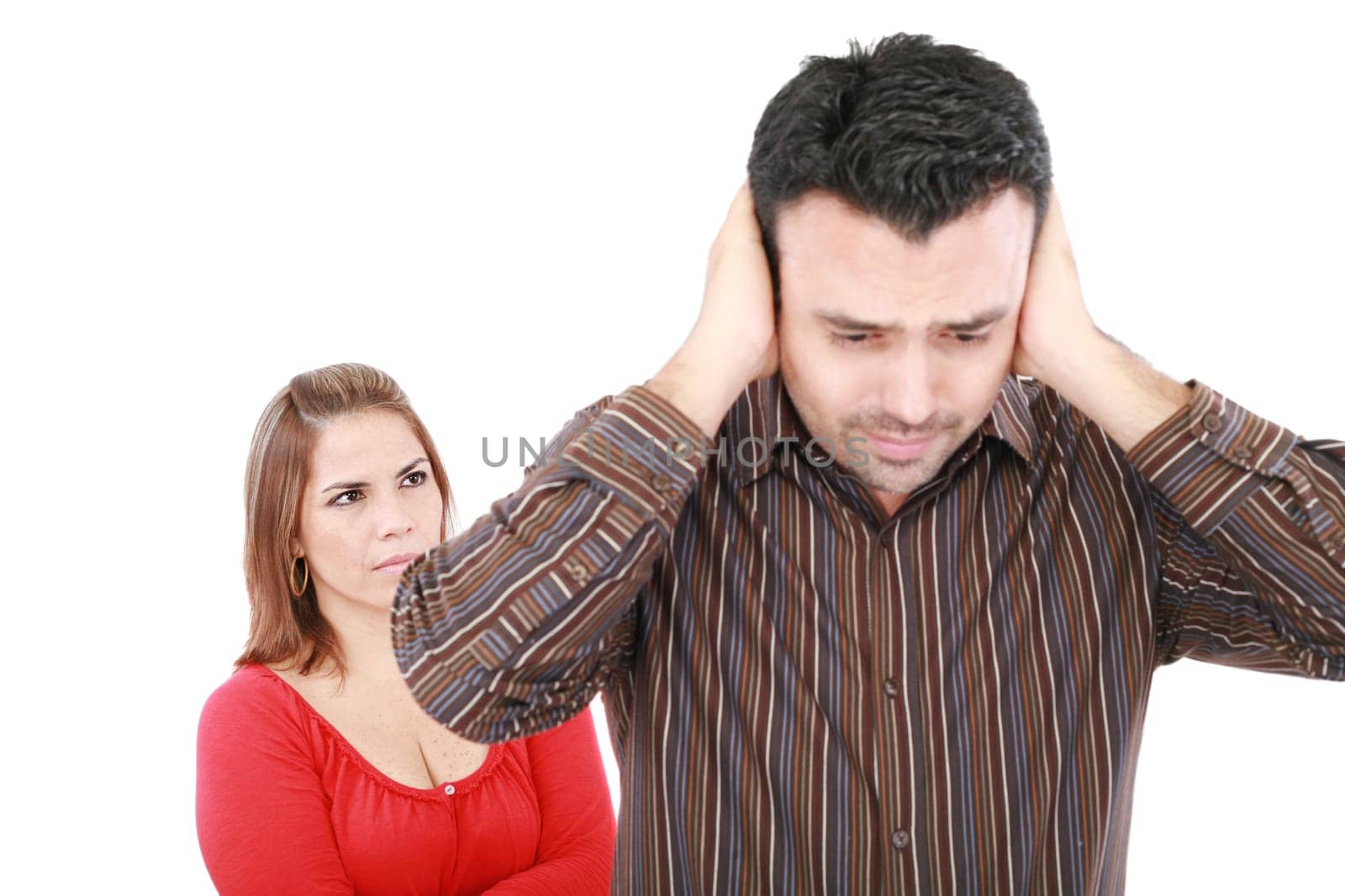Young man and woman angry and conflicting. Focus on woman