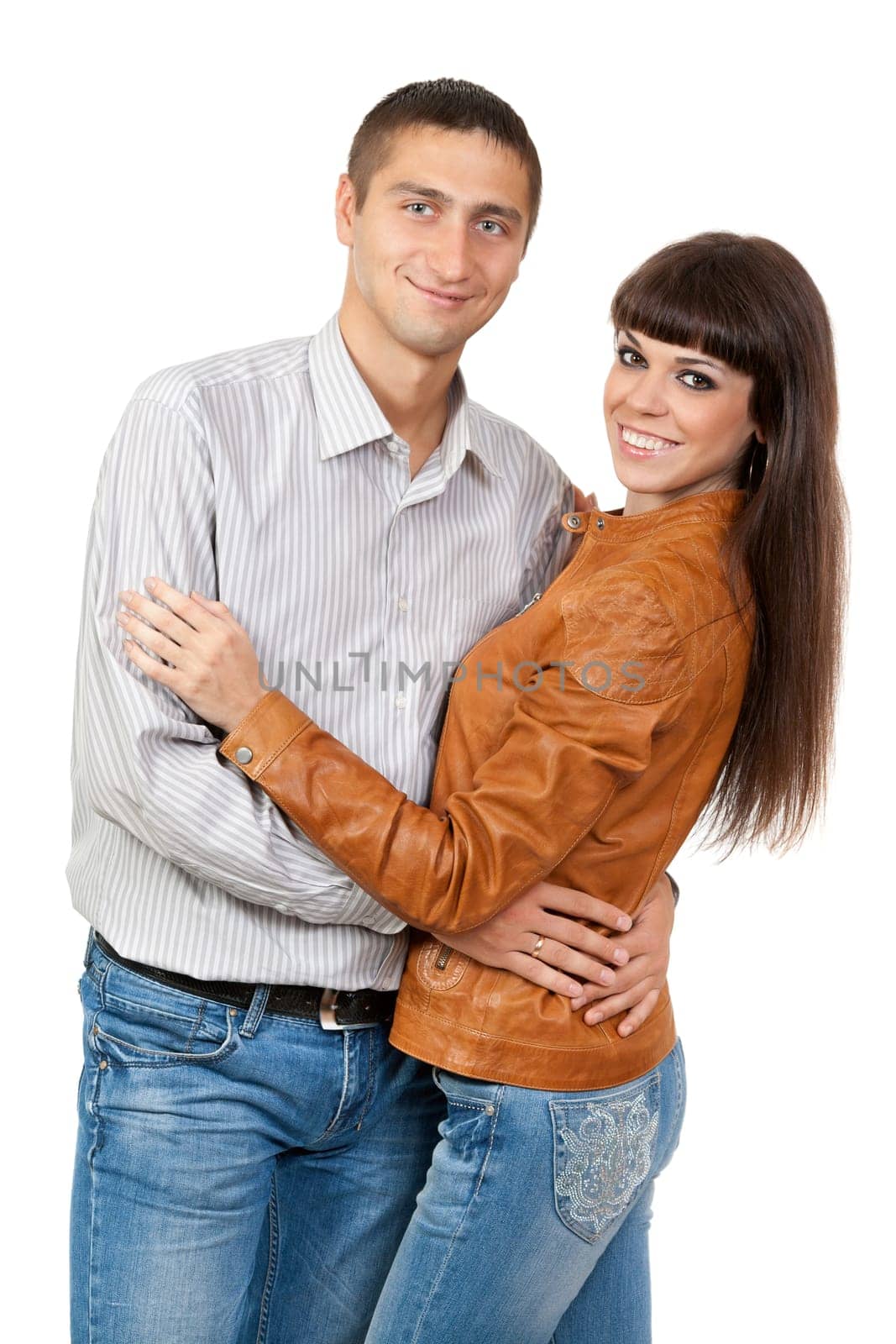 Closeup portrait of a beautiful young couple smiling together
