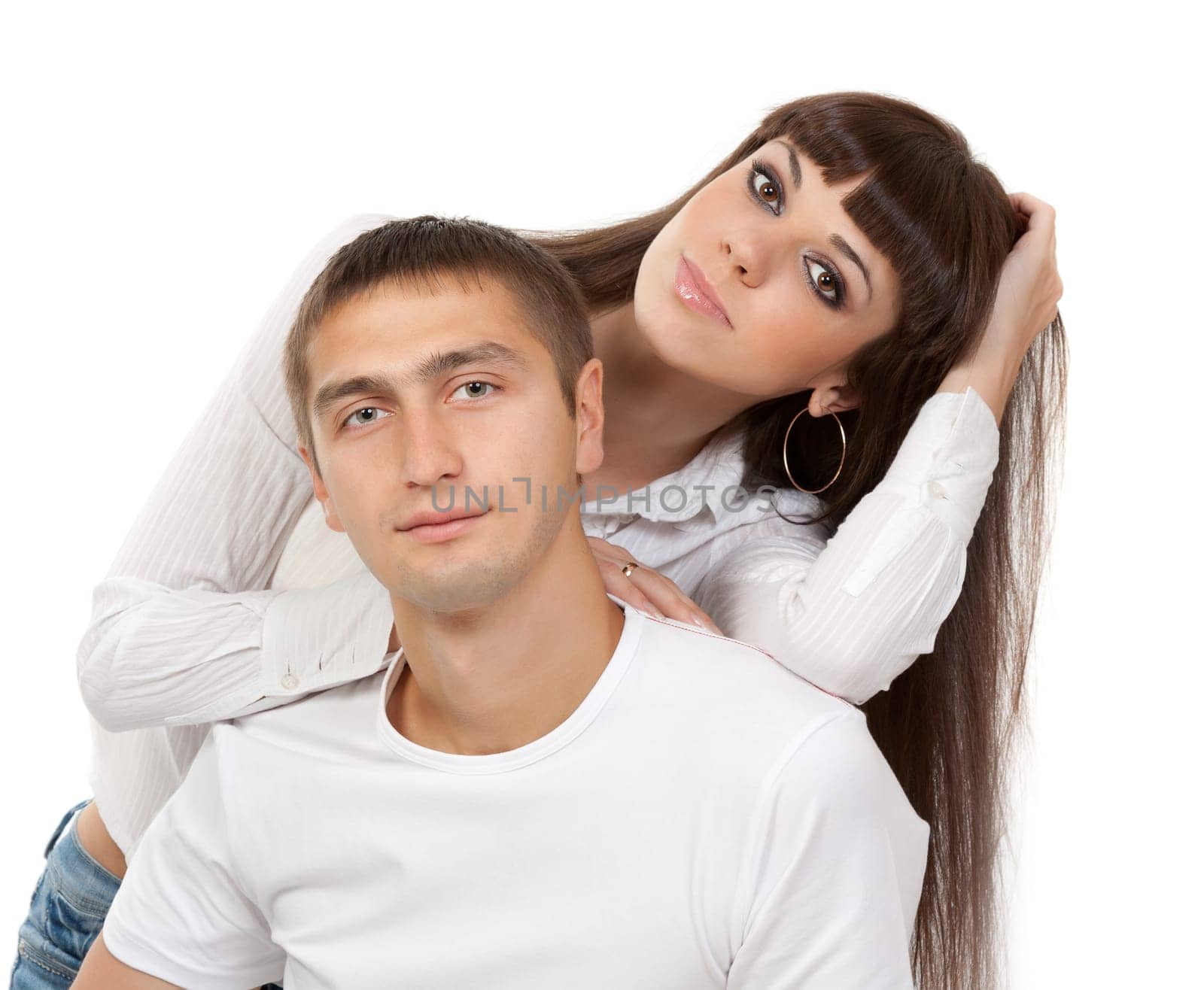 love smiling couple embracing in the studio. Isolate on white