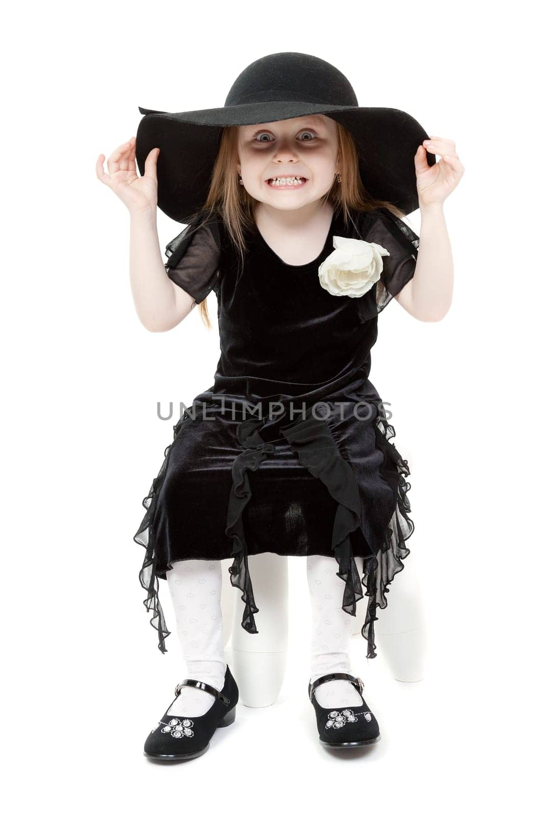 A little sweet girl felt hat is scary faces
