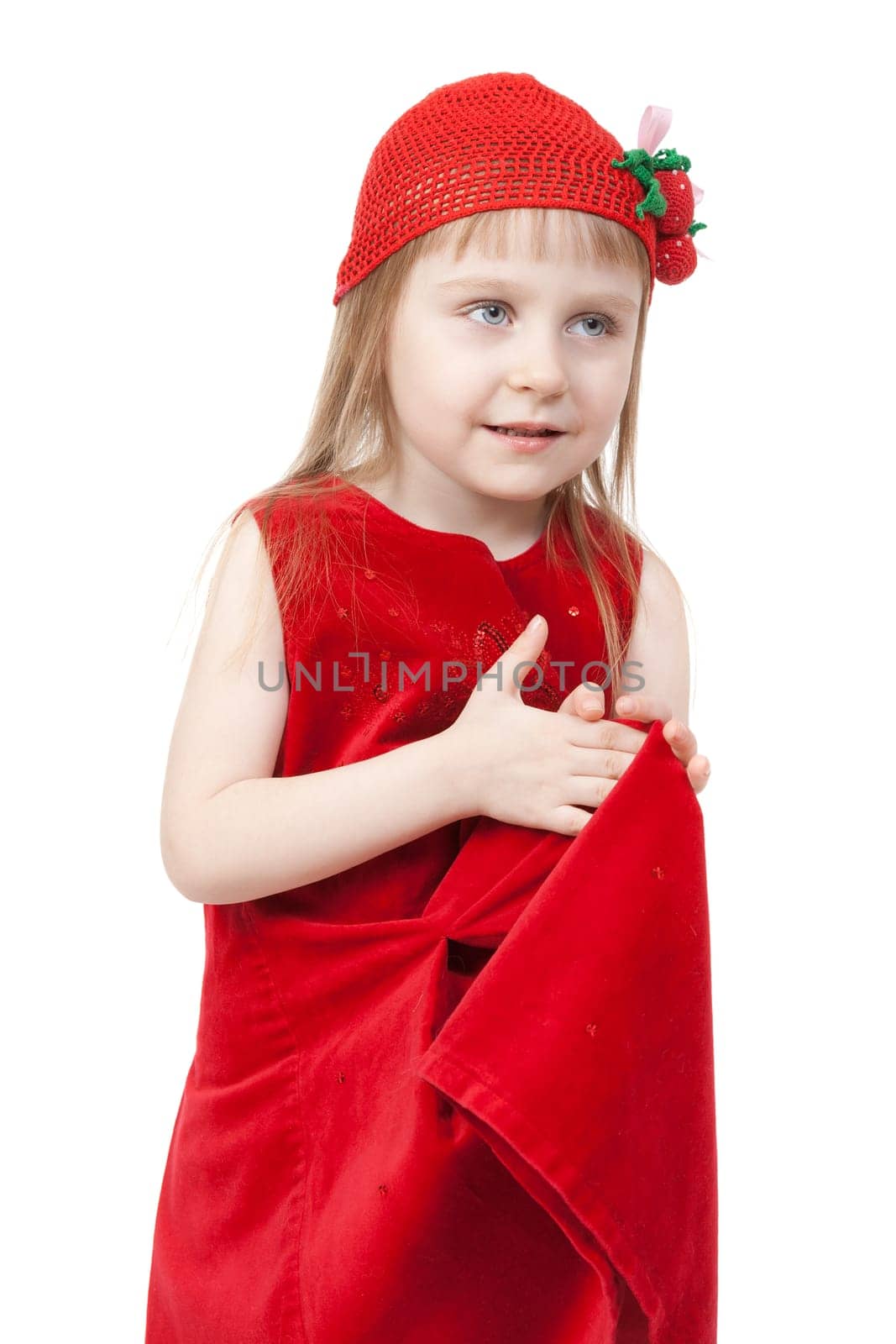 The little girl in a red hat with strawberries isolated on white background