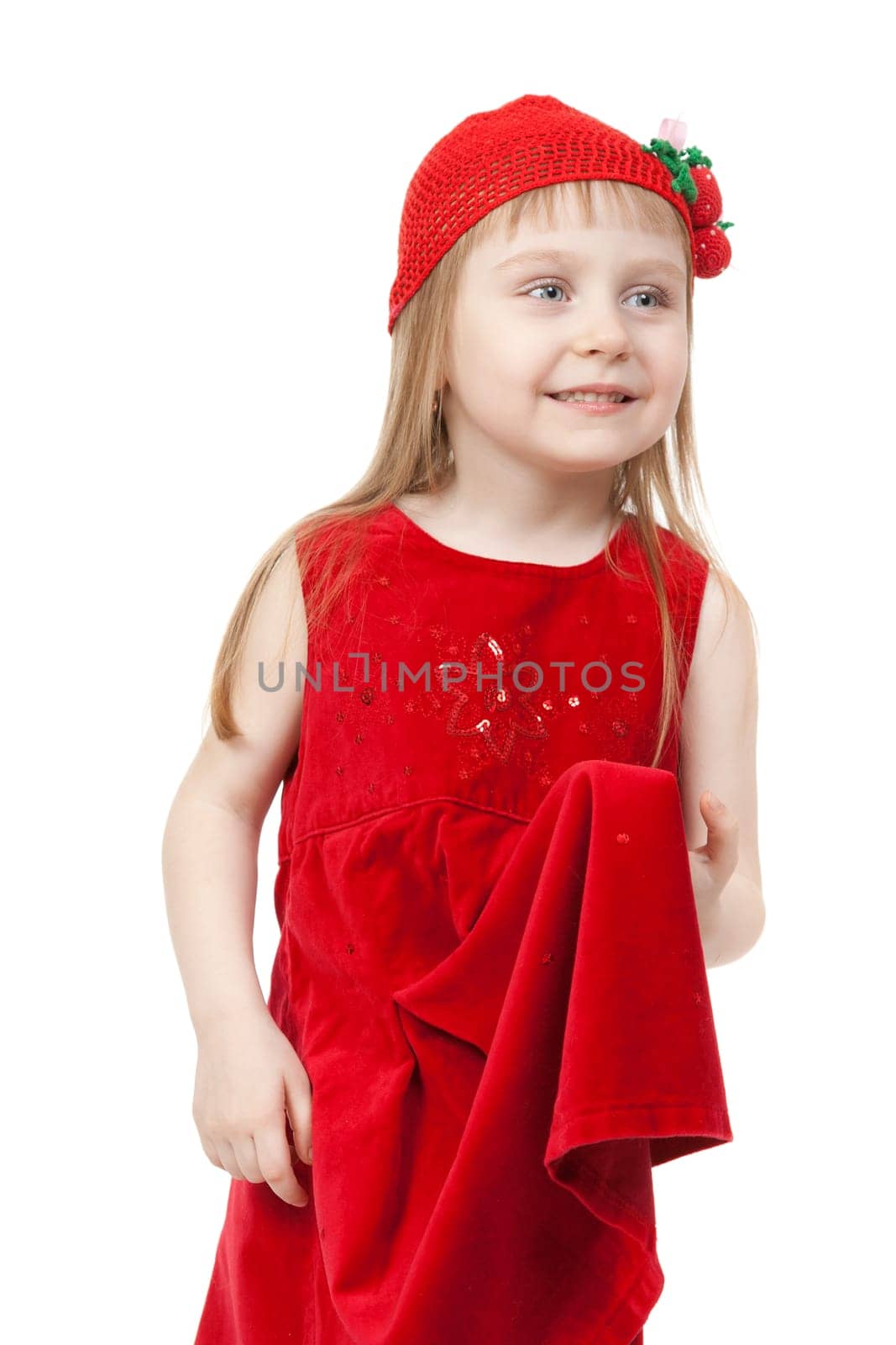 Charming little girl in red cap and gown