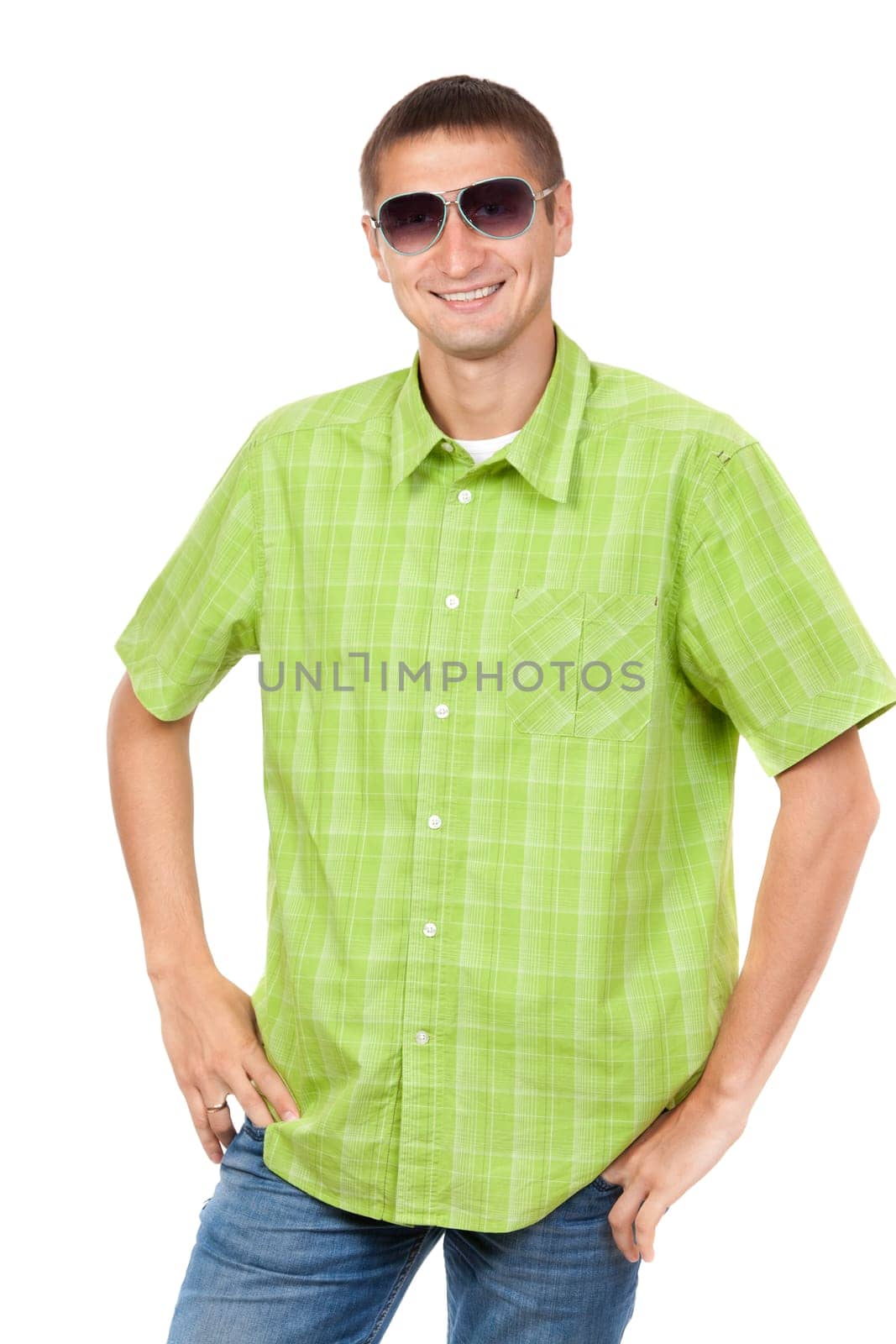 Portrait of a man aged 25 years, wearing sunglasses in a plaid shirt, green studio isolated on white background