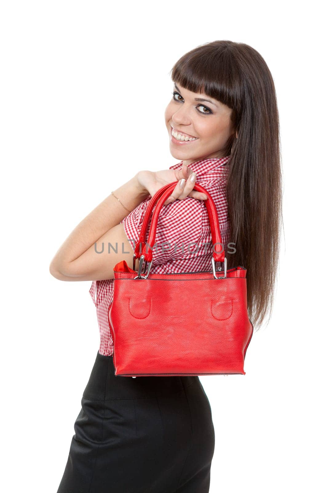 Portrait of a girl with a fashionable red handbag. Isolate on white.