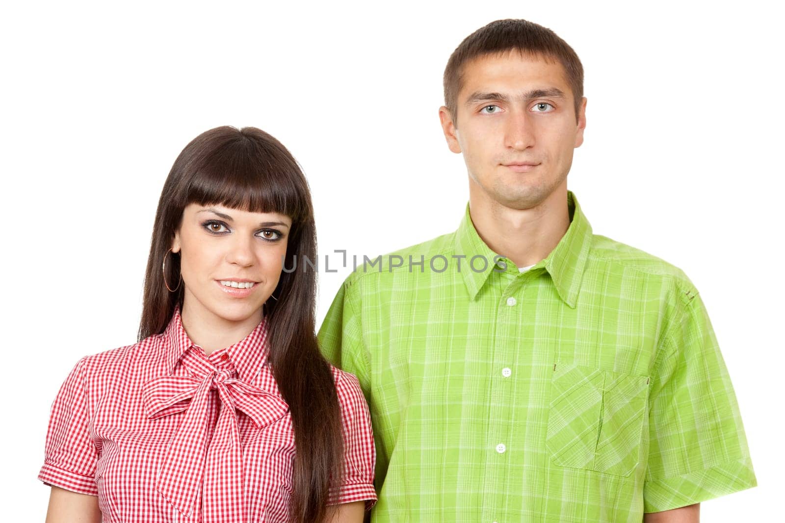 Family portrait, a beautiful young couple in colored clothing.