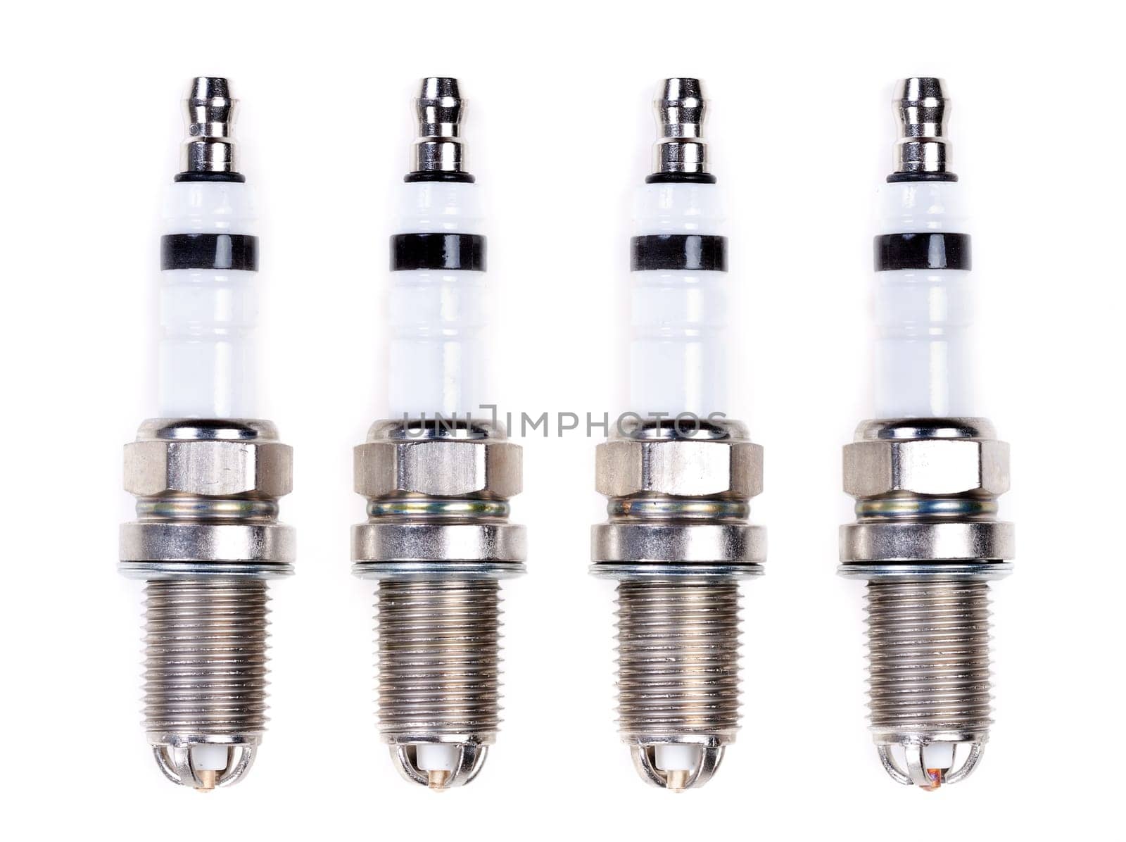 set of spark plugs isolated on white