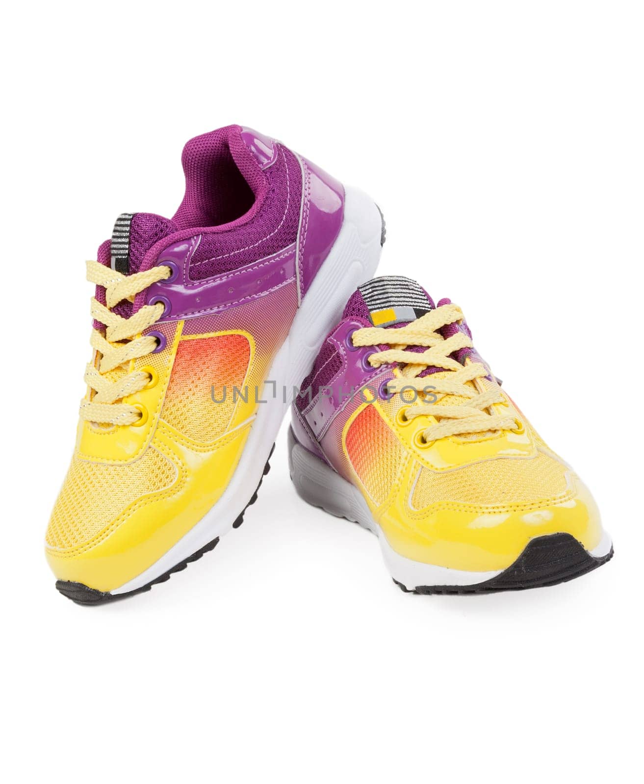 A pair of new soirt shoes, all logos and markings removed. Studio shot on white, not isolated