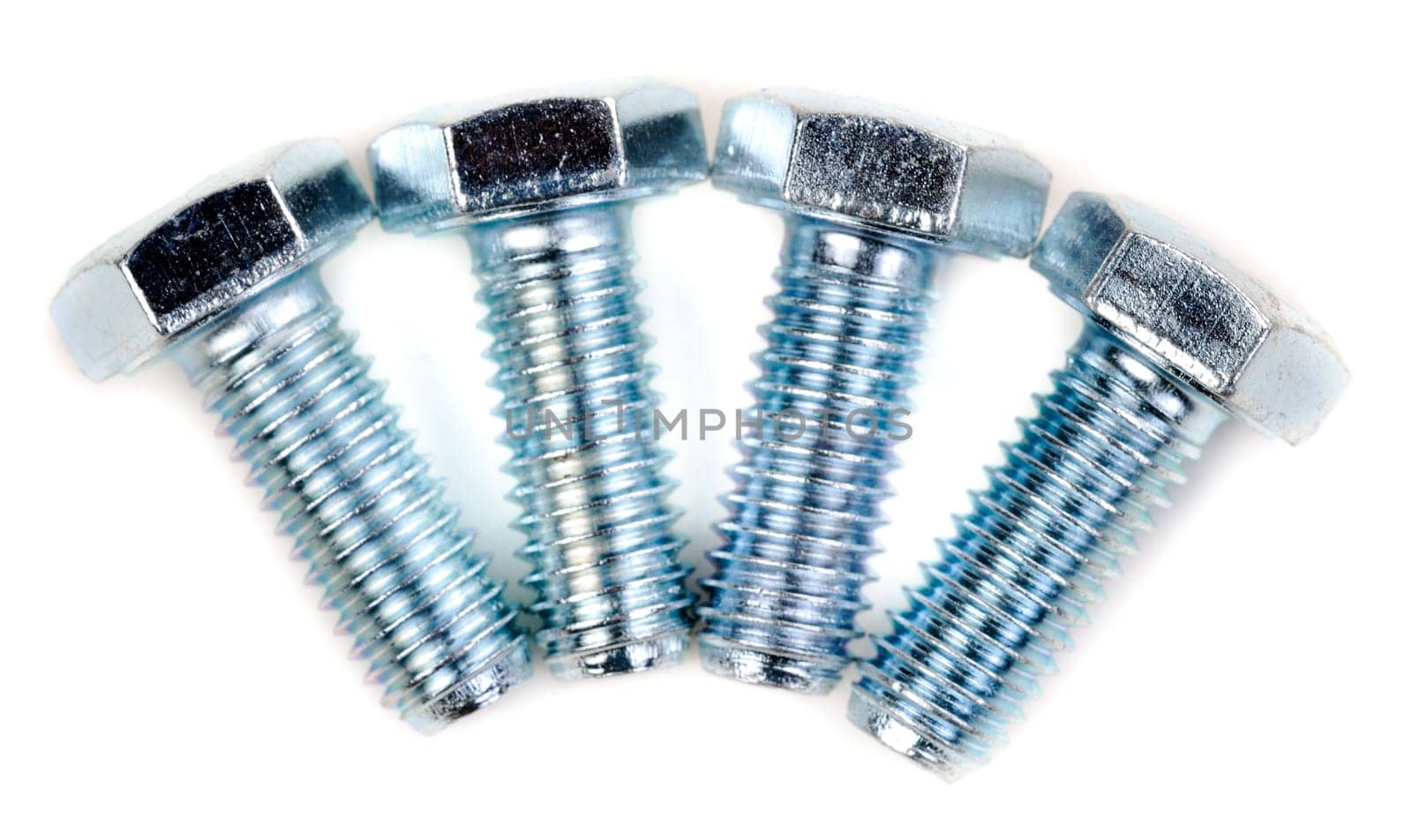 Four steel screws isolated on white background