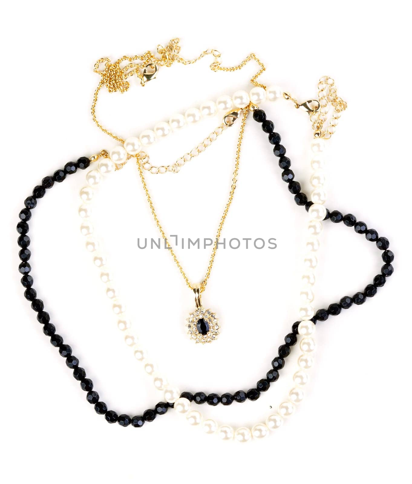beads and chain with a pendant on a white background
