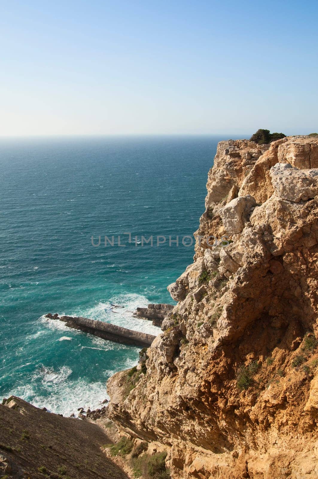 Detail of the sandstone cliffs of the southern portuguese coastline, Comporta, Portugal