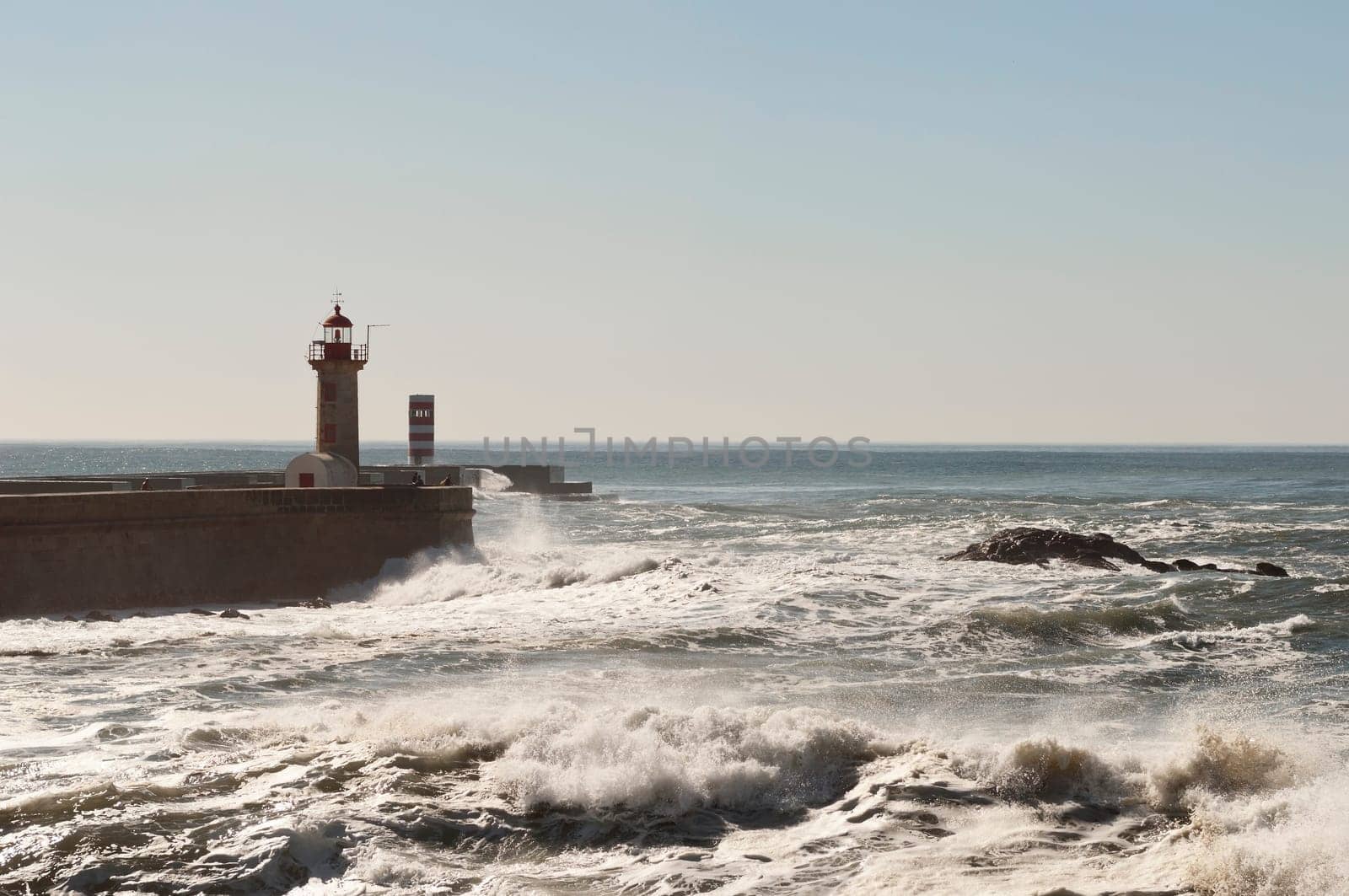 Historic lighthouse of Felgueiras in the river mouth of Douro, Porto, Portugal